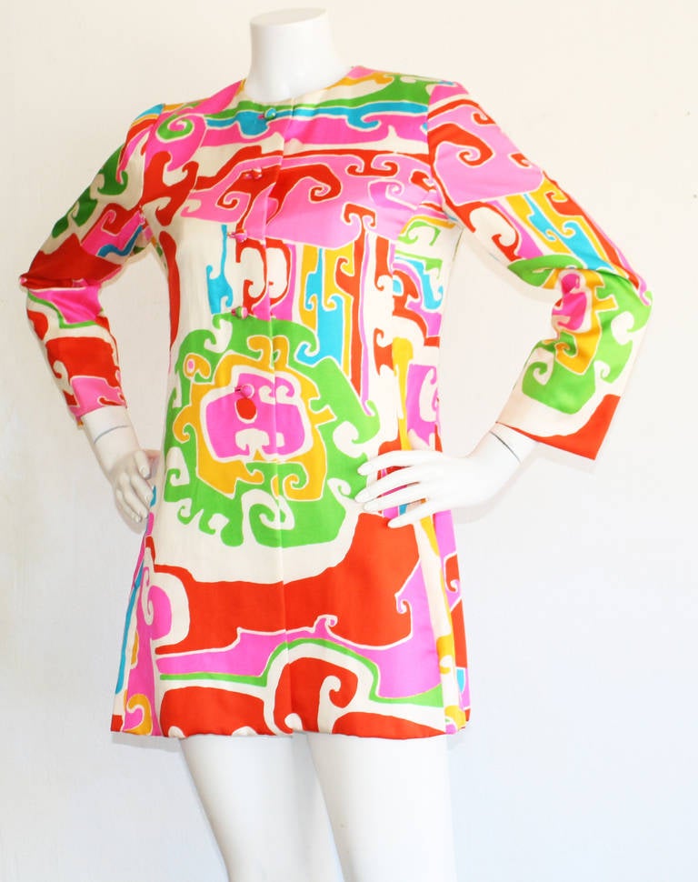 Vintage 1960s vintage B.H. Wragge colorful silk jacket. Rare find, and an incredible print! Can be worn a number of ways. Great from day to night. All silk, and fully lined. Buttons down front. In great condition. Approximately Size