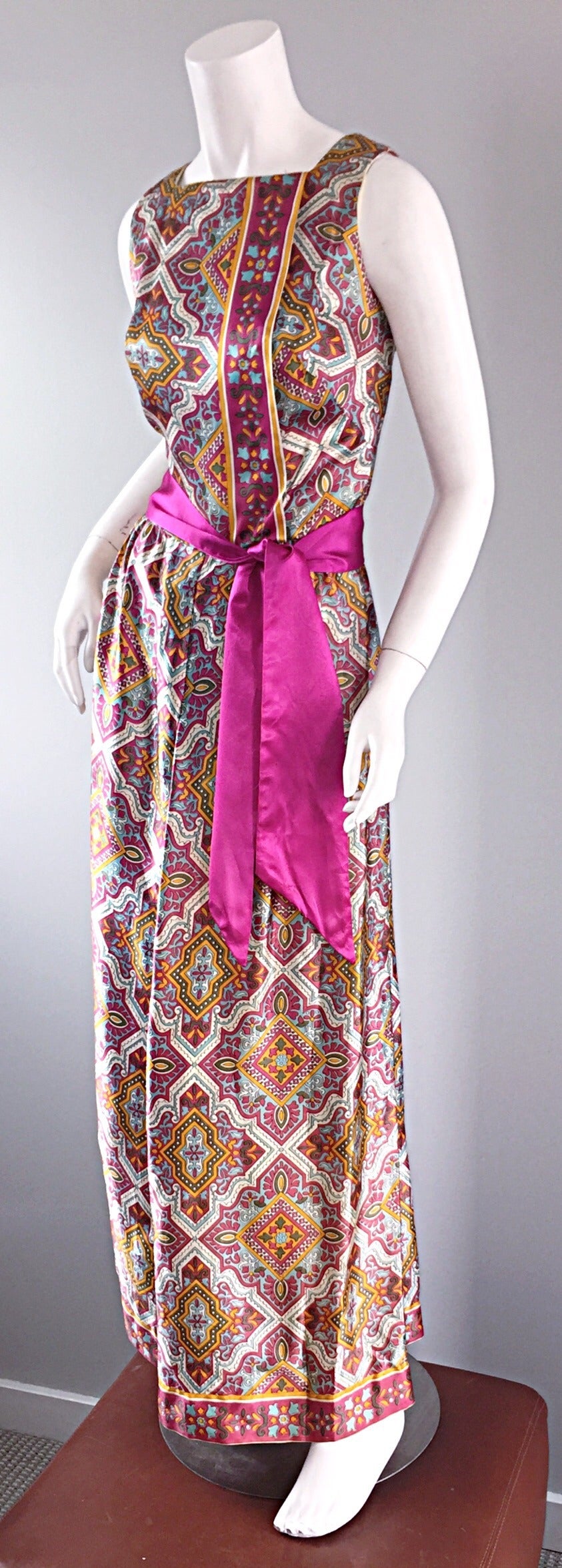 Out of this world vintage Roberta Lynn silk jumpsuit! Features wonderful ethnic prints throughout, with a fuchsia silk wrap style belt, which is detachable. Roberta Lynn was a well-known designer in the 1960s and 70s, and dressed many of Hollywood's