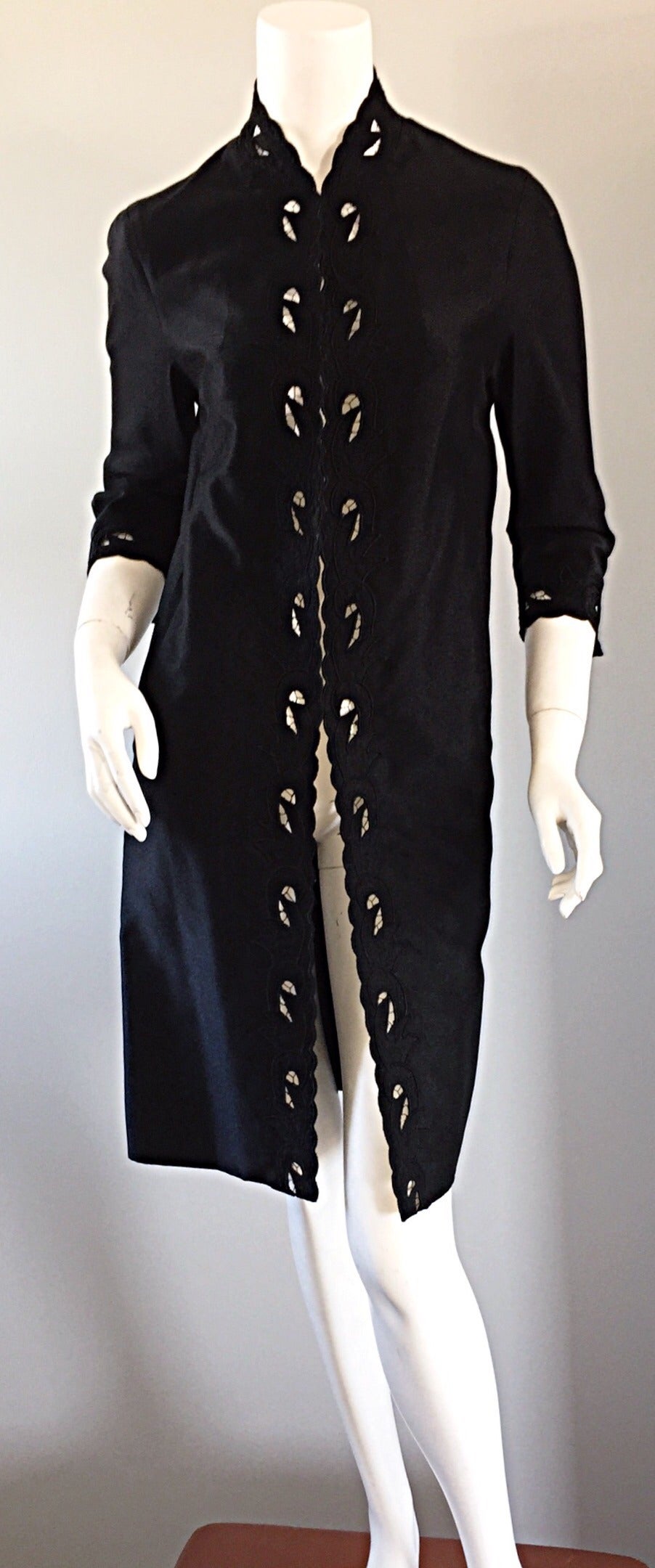 Wonderful, chic 1940s vintage opera / duster jacket! Jet black color, with scalloped edges, and intricate crochet cut-out details down the center, at sleeve cuffs, and at neck. Embroidery details on front. 3/4 length sleeves, with hook-and-eye