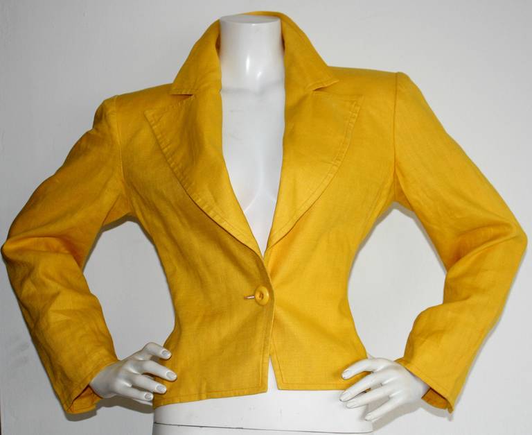 Vintage Yves Saint Laurent bright yellow blazer. From the Rive Gauche line, this beauty adds a pop to any outfit, without being too over-bearing. Looks great with the pictured vintage YSL skirt that is for sale in my 1stDibs store. 
Blazer is in
