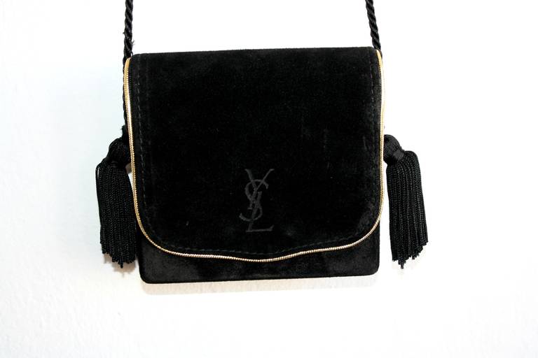 Beautiful very important vintage Yves Saint Laurent black suede tassel purse from the famed 