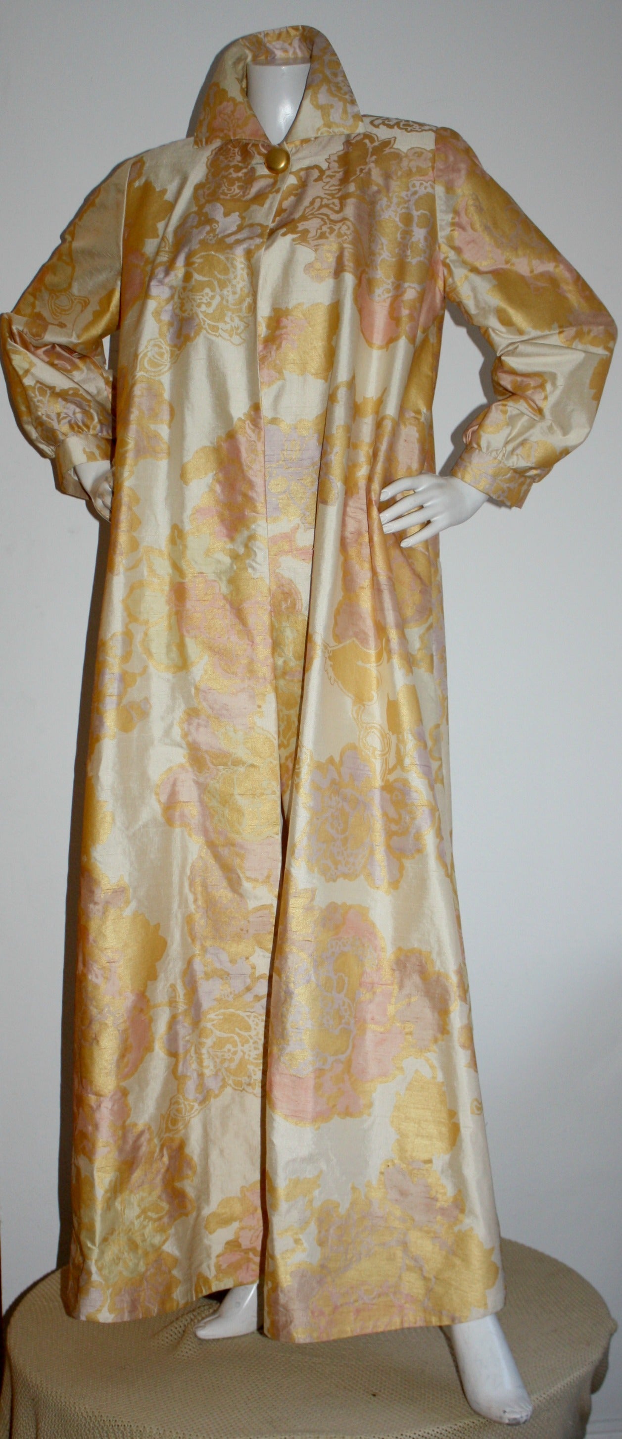 Insanely gorgeous vintage hand-painted silk opera coat! Dramatic ballon sleeves, with a single oversized gold button at neck. Metallic gold and pink throughout. Wonderfully constructed. Would look over a dress or gown, or perfected belted as a gown.