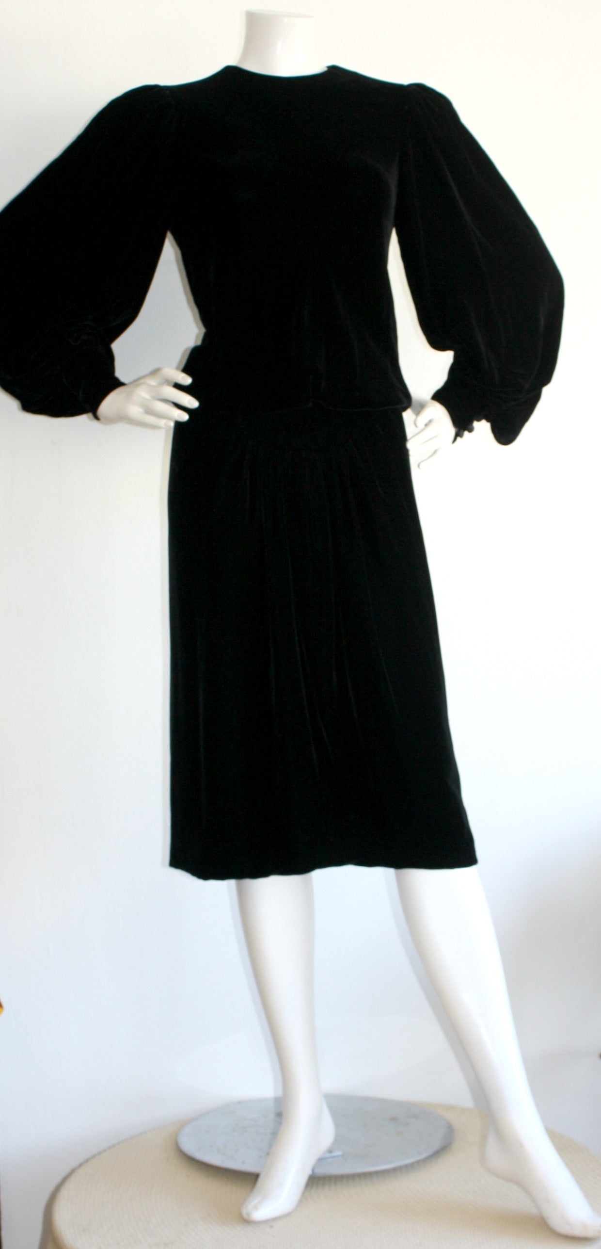 Stunning vintage Oscar de la Renta black silk velvet dress! Chic buttons up the back, with balloon sleeves. This velvet is so soft!!! Darting detail at waist makes for a very flattering fit. Inside support waistband. Perfect dress for a holiday