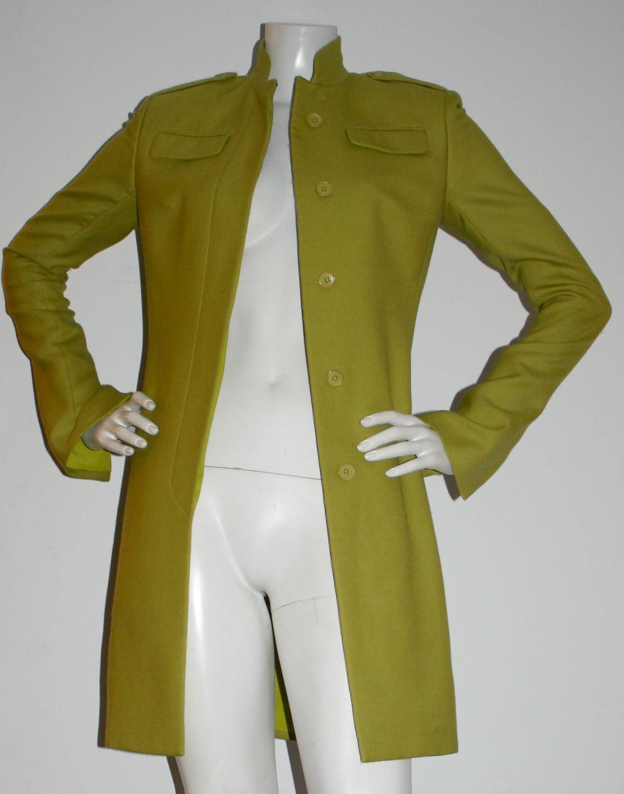 Gorgeous vintage Richard Tyler Couture military-inspired jacket. This is a runway sample piece from the 1990s. Vivid chartreuse color, with chic slits on inner cuff for a bell-effect...Perfect to accommodate gloves. Hidden buttons up the front.