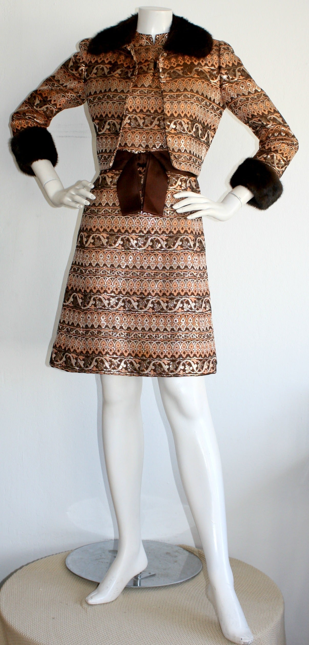 Beautiful very early Adele Simpson dress and jacket! A stunning set, with silk brocade in pinks, browns and creams. Jacket features buttons at the bust, and mink trim at collar and cuffs. Perfect together, or as separates! Both fully lined. In great