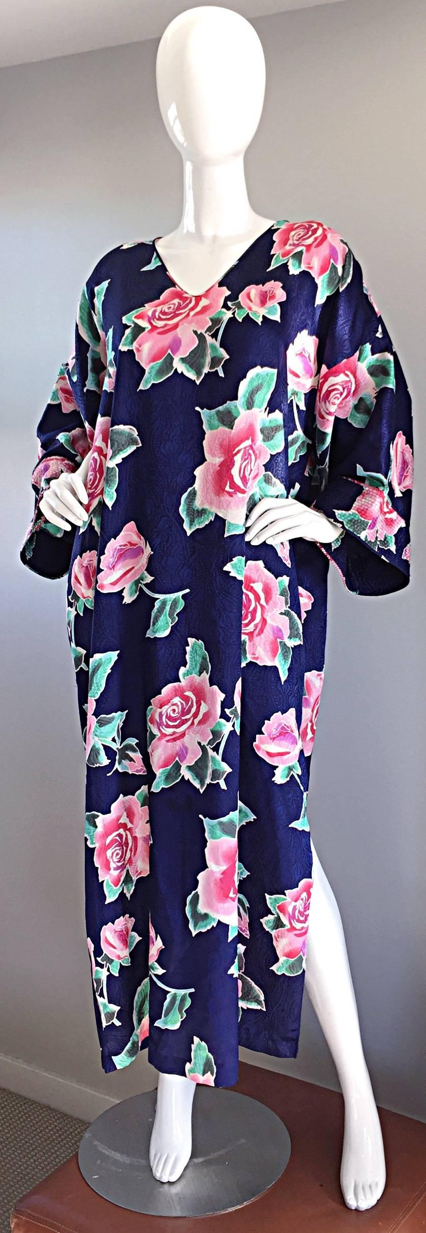 Beautiful vintage MARY MCFADDEN 3-Dimensional caftan / kaftan! Vibrant purple color, with oversized pink roses printed throughout. Slit up one side of the hem. Looks great alone, or belted. Soft silky feel, that is so comfortable! Perfect for day or