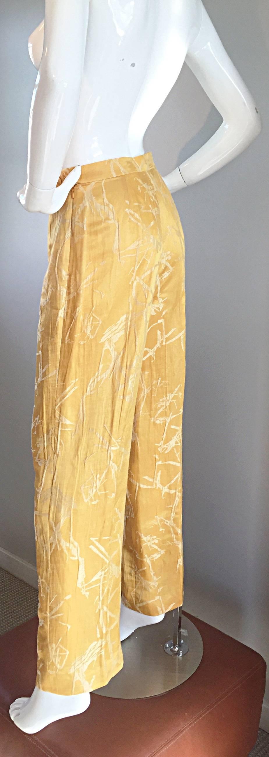 Amazing vintage CHRISTIAN LACROIX silk shantung high waisted, wide leg trousers! Wonderful golden yellow color, with hand-sewn ivory silk thread in an Oriental print. A stunning fit, that never goes out of style! Hidden zipper up the side, with