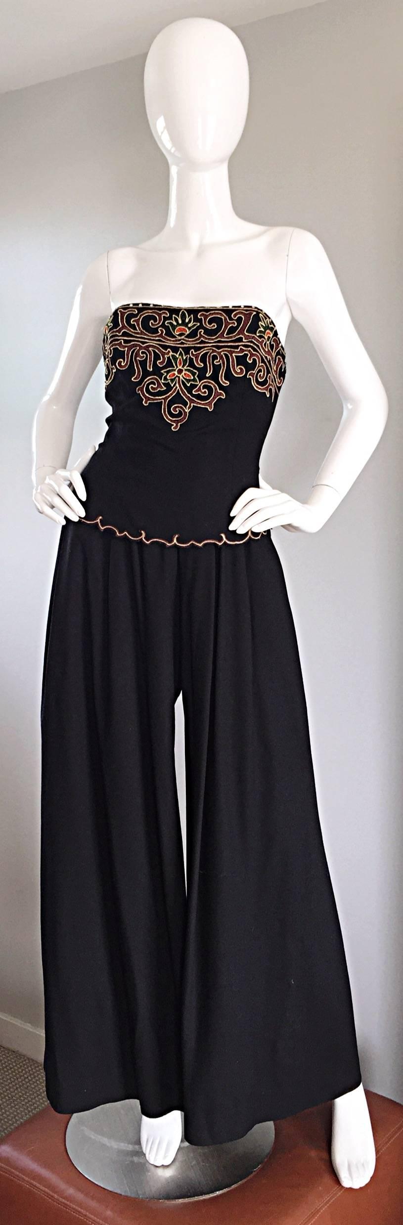 Exceptional, and super rare vintage PIERRE BALMAIN black strapless jumpsuit! Wonderful wide leg palazzos, that are so flattering, and uber chic! Regal hand embroidery at bodice, adorned with rhinestones at top edge. Bodice is also boned for