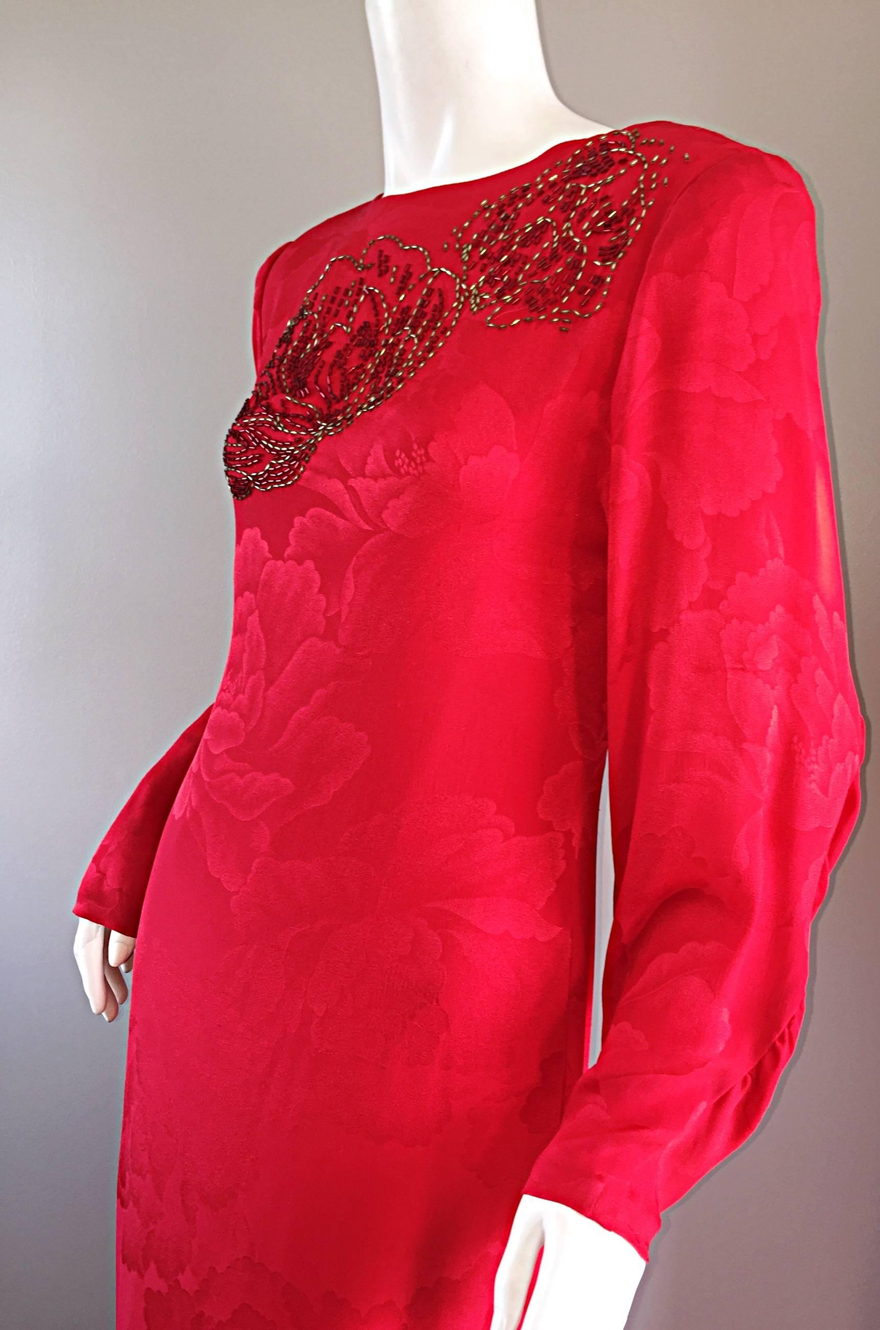 Absolutely beautiful vintage HANAE MORI lipstick red long sleeve column gown!  Wonderful shape, that looks amazing on! Luxurious silk, with a red floral theme throughout. Features POCKETS at both sides of the waist. Hand beaded detail at the bust