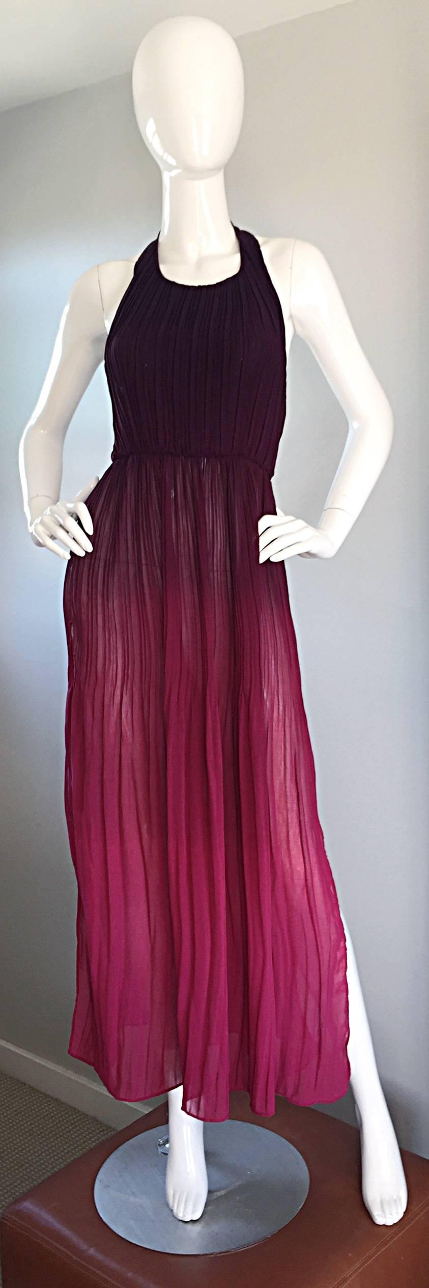 Sexy 70s burgundy ombre halter maxi dress! Features are dark purple / burgundy at bodice, gradually evolving into a beautiful raspberry pink color. Flattering cut, with slits at both sides. Halter style, with button closure at back neck. Looks great