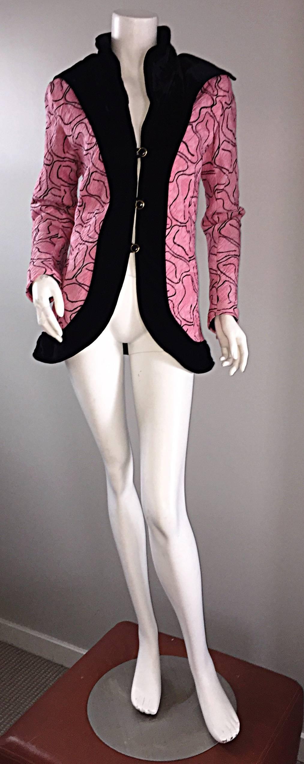 Fabulous vintage EMANUEL UNGARO pink and black Avant Garde jacket! Features out-of-this-world exaggerated black silk velvet pointed lapels, leading down to the bottom hem, which wraps around the entire jacket. Wonderful print, that is extremely