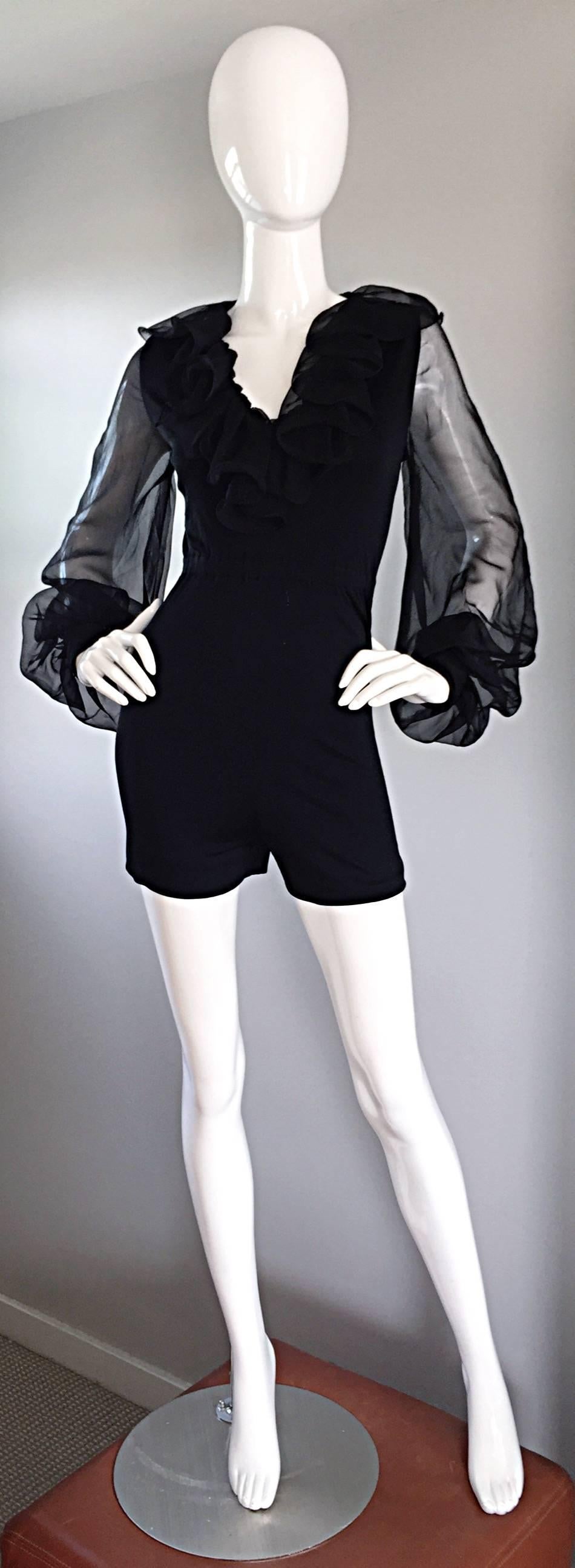 In all of my years of collecting vintage, I have never seen a piece quite like this 70s black stretch jersey playsuit / jumpsuit! Attributed to Mollie Parnis (original owner lost the label at dry cleaner years back. Only worn once!) Guaranteed