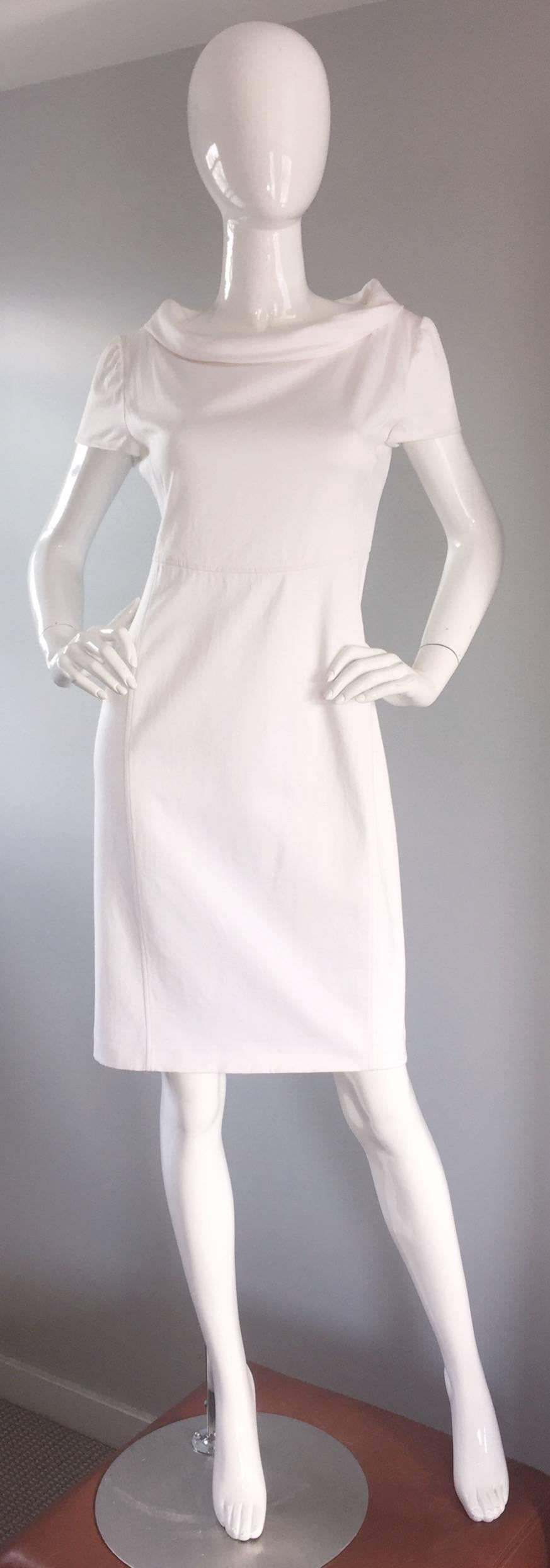 Brand new, never worn super chic VALENTINO stark white dress! Jackie O style, reminiscent of the 1960s. Flattering fit, with an equally flattering cowl neck. Cotton, with some stretch. Hidden zipper up the back, with three hook-and-eye closures at