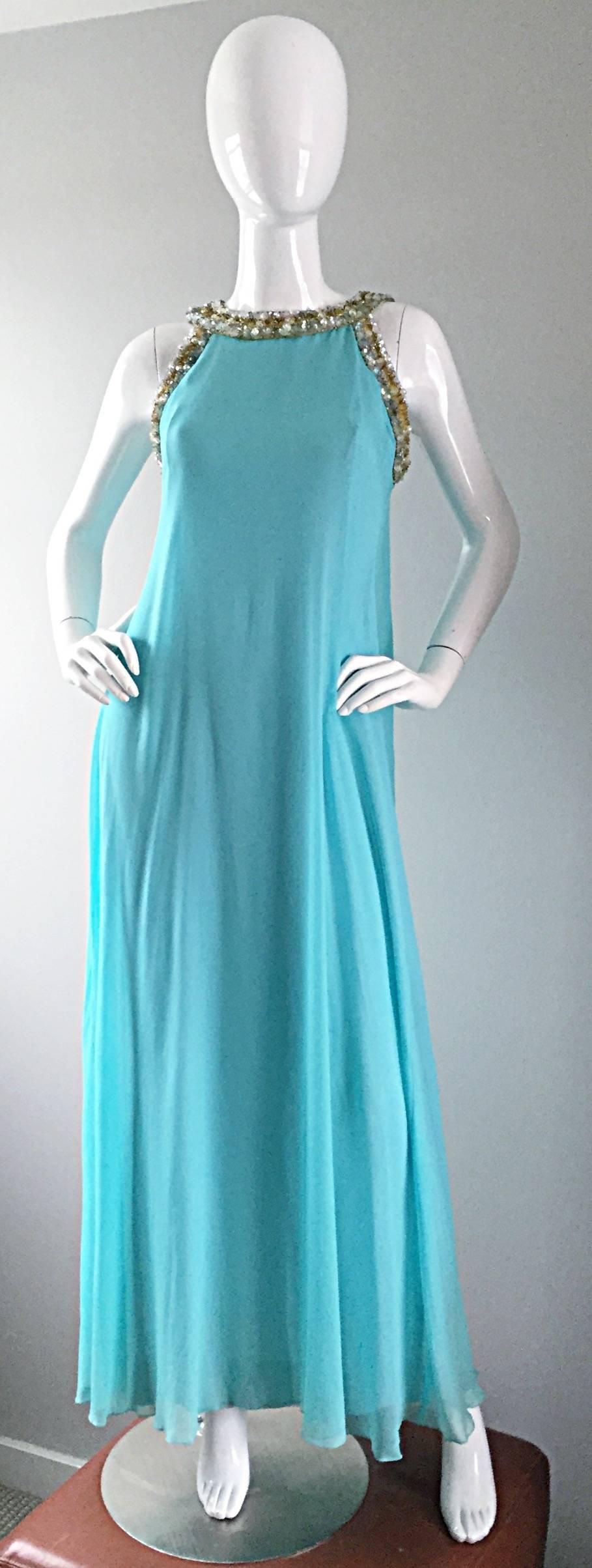 Beautiful vintage 60s LORD AND TAYLOR baby blue chiffon grecian inspired empire gown / dress! Exquisite pale blue chiffon, that flows with movement. Stunning silhouette, with an impressive amount of attention to detail. Beaded rhinestone collar, and