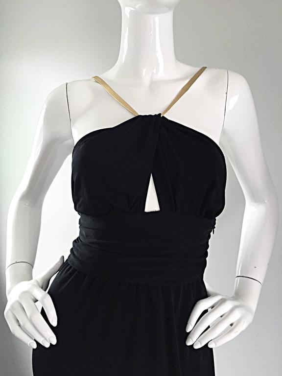 black dress with gold straps