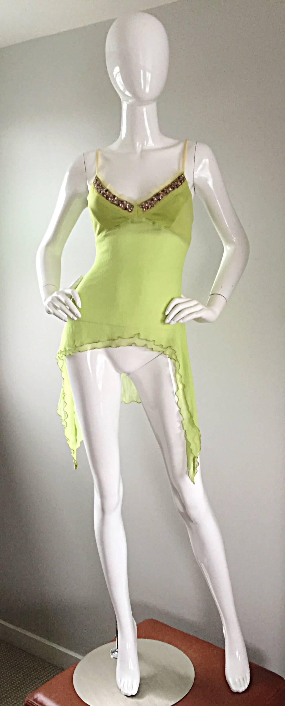 Exquisite ALEXANDER MCQUEEN chartreuse / lime green silk chiffon asymmetrical jeweled blouse! Brand new with original tags from 2004. Features hand-sewn colorful crystal rhinestones at bodice. Flowy layers of asymmetrical silk chiffon. Semi-sheer