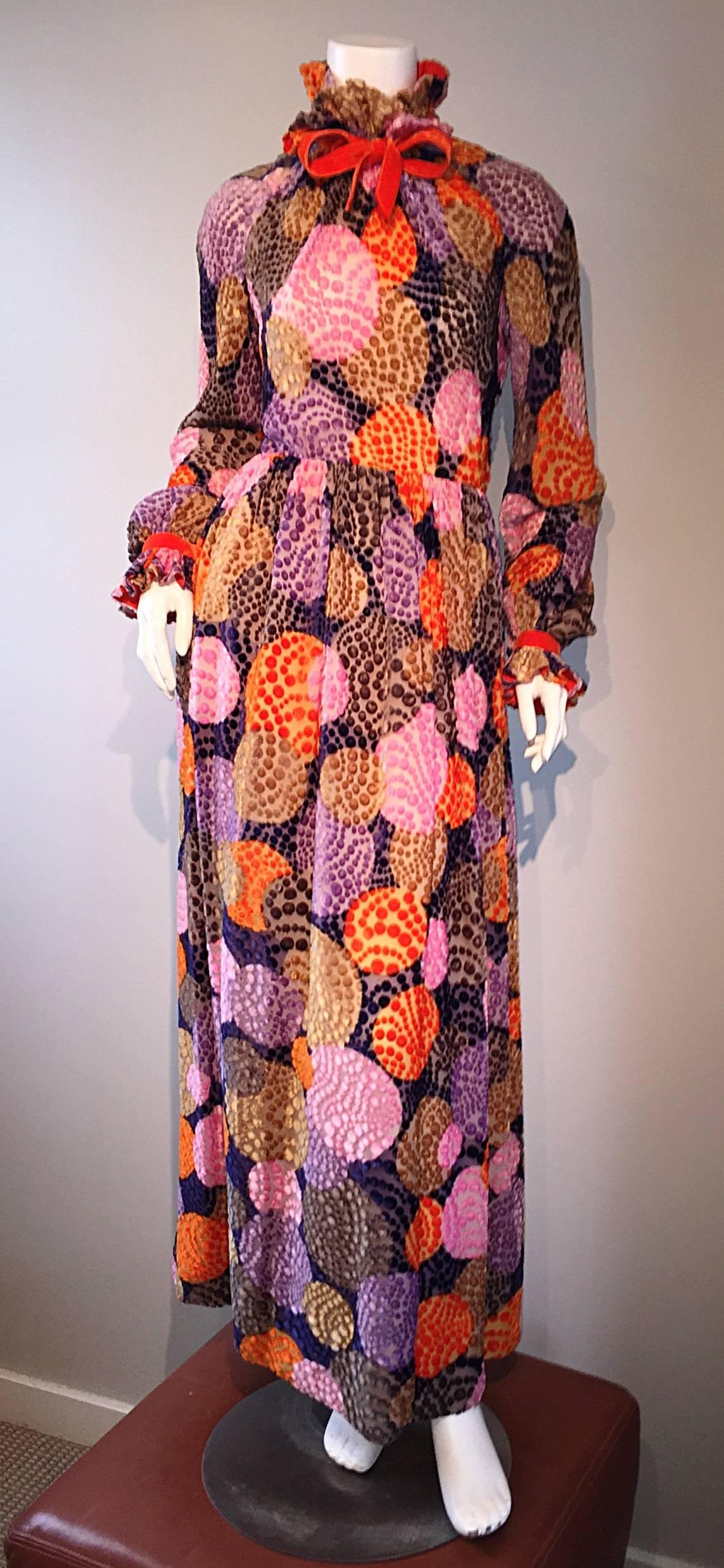 Sensational vintage GEOFFREY BEENE silk dress, with burnt-out silk velvet! Beautiful colors of purples, pinks, oranges, and taupe, that form an op-art polka dot print throughout. Full zip up the back, with two hook-and-eye closures at back neck.
