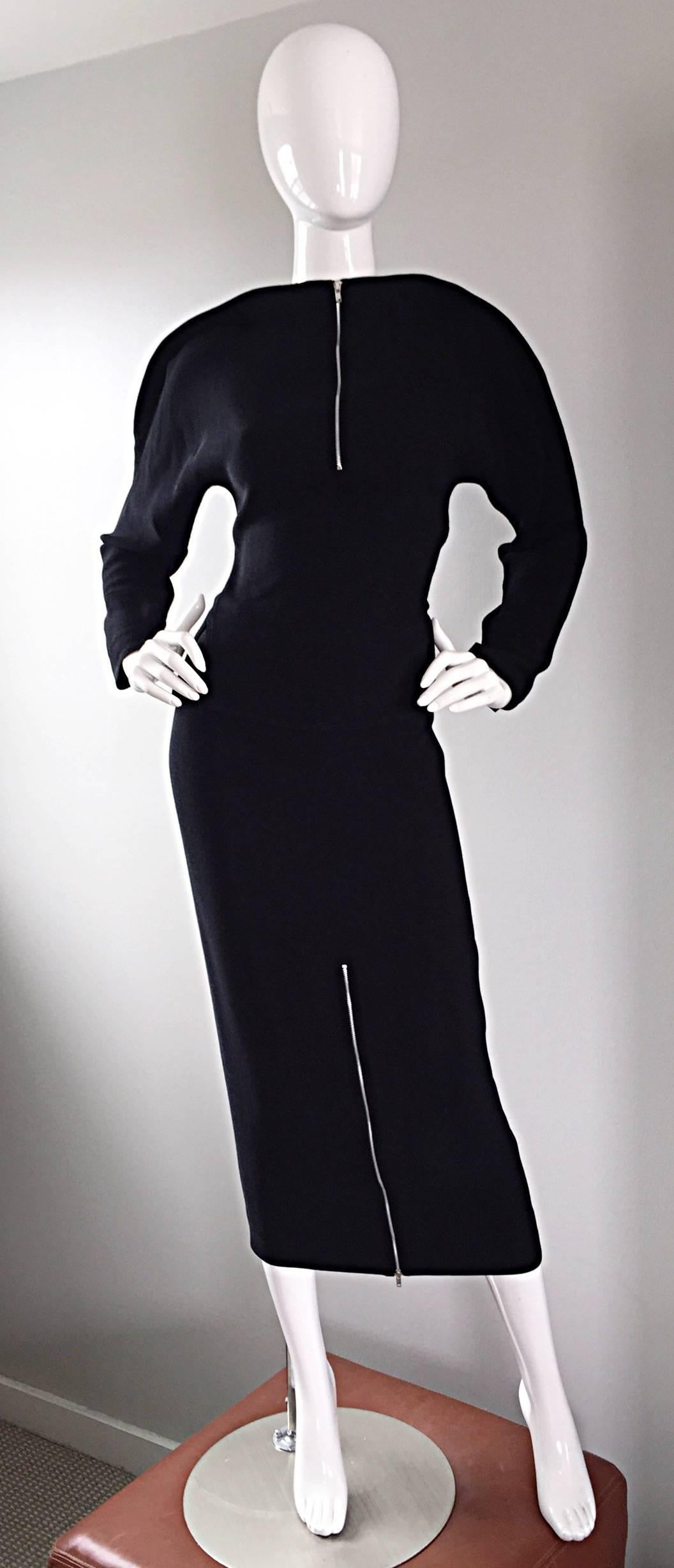 Important, and super rare vintage GEOFFREY BEENE minimalist 'zipper' ensemble! Features a black crepe top, with two vents on either side of the waist. Functional silver metal zipper up the front, which can also be left partially open. Avant Garde