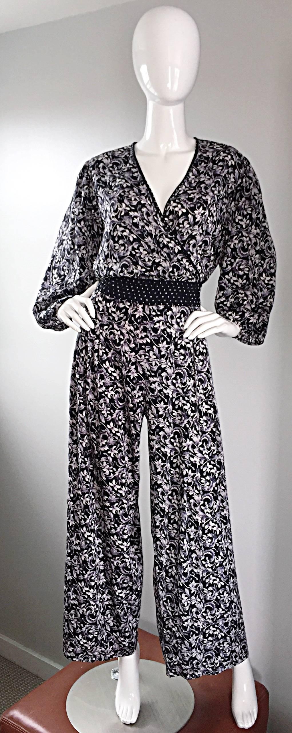 Amazing vintage DIANE FRES / FREIS black and white boho jumpsuit! Signature Fres style, with an elastic waist (meant to fit a wide variety of sizes). Her jumpsuits are very rare to come by, and highly sought after. Wide palazzo legs, and a v-neck
