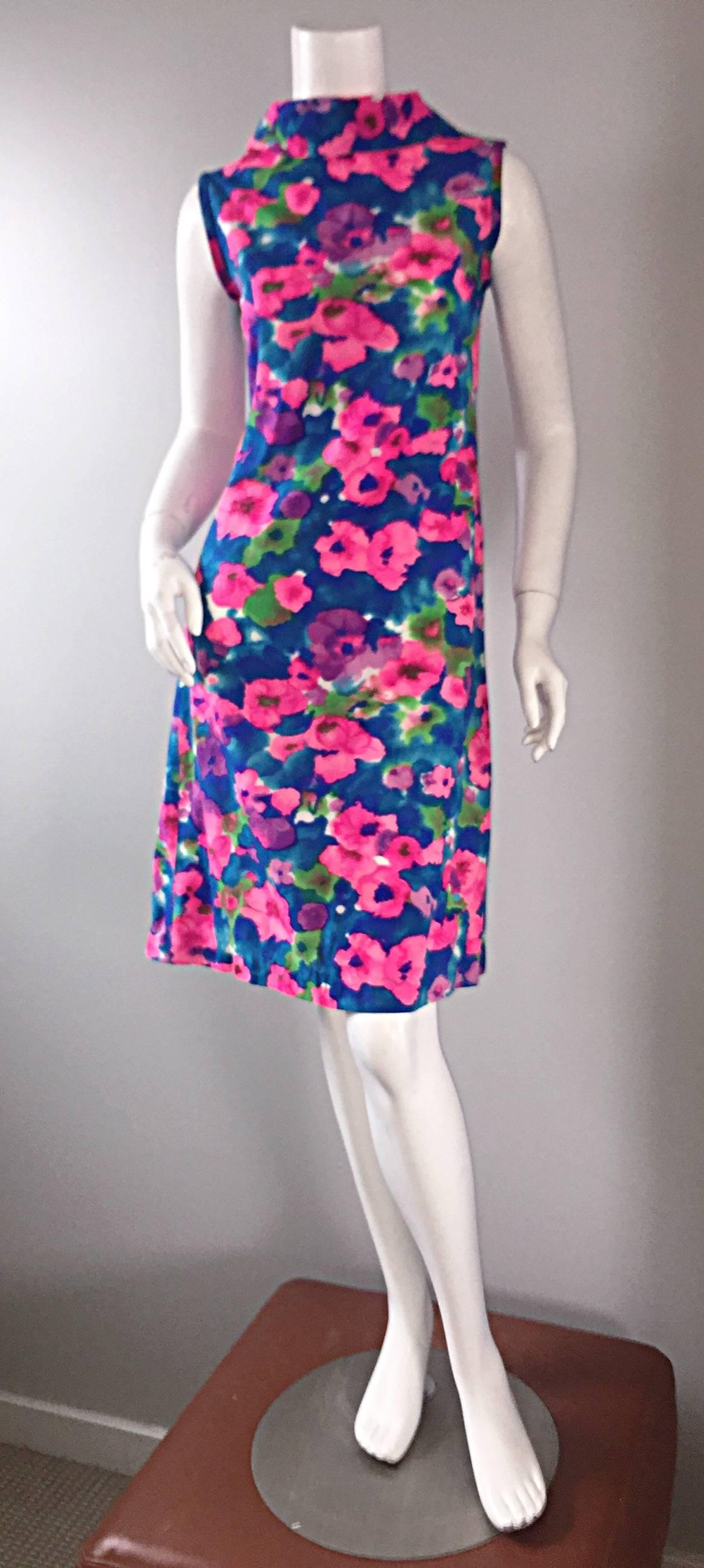 Chic 1960s watercolor floral dress! Beautiful vibrant colors of pink, purple, blue, green, and white, forming a wonderful floral watercolor print! Jackie-O style, with a high neck collar, and flared skirt. Luxurious cotton/silk blend, with a full