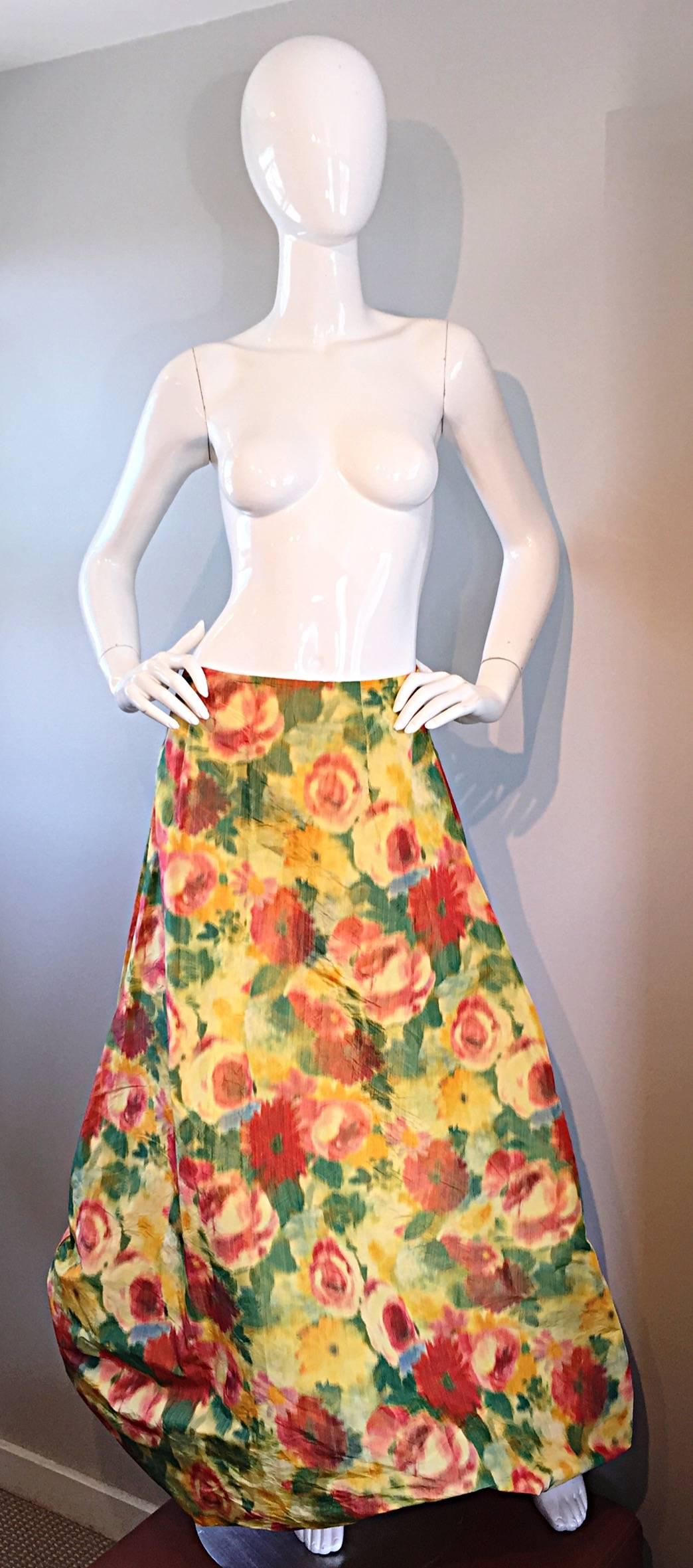 Beautiful vintage bubble maxi skirt! Features flowers printed throughout that looks like a watercolor painting. Hidden zipper up the back, on what feels like a silk taffeta. Impeccable construction. The possibilities are endless with this beauty!