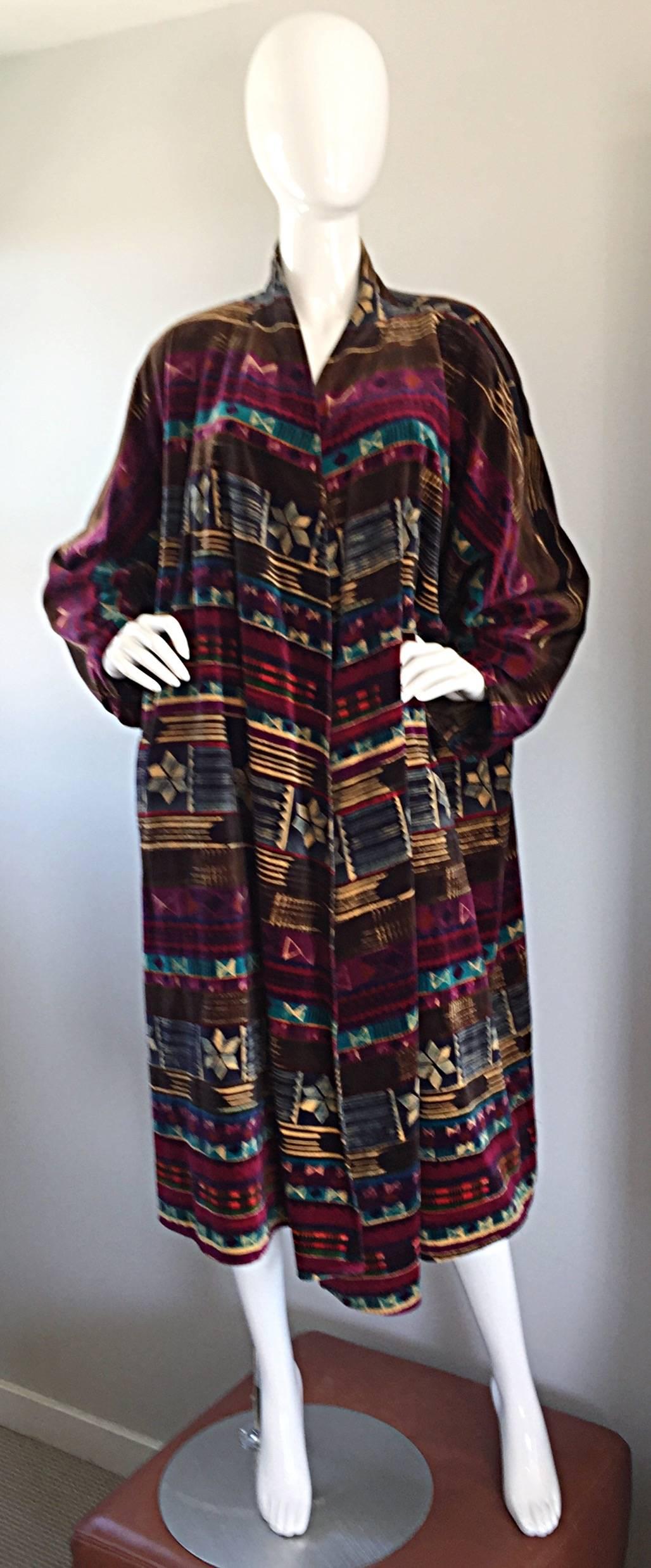 Exceptional vintage ESCADA, by MARGARETHA LEY, tribal print velvet opera jacket / evening coat! Vibrant ethnic print, with colors mixed incredibly well--Teal blue, burgundy wine, brown, ivory, and blue. Couture quality workmanship, with a heavy eye