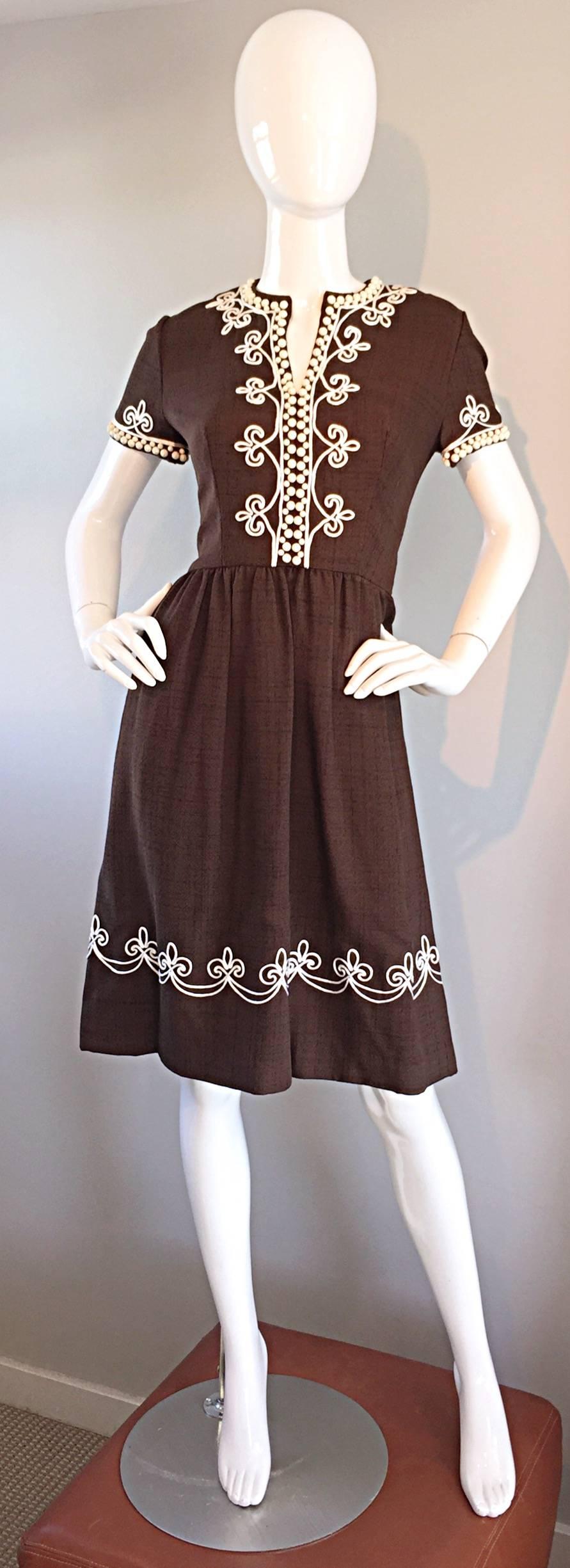 Chic 1960s OSCAR DE LA RENTA brown and white linen dress! Coffee colored brown, with white embroidery tracing the hem, bodice, and sleeves. White beads up the bodice and at sleeve cuffs. Full metal zipper up the back, with hook-and-eye closure.