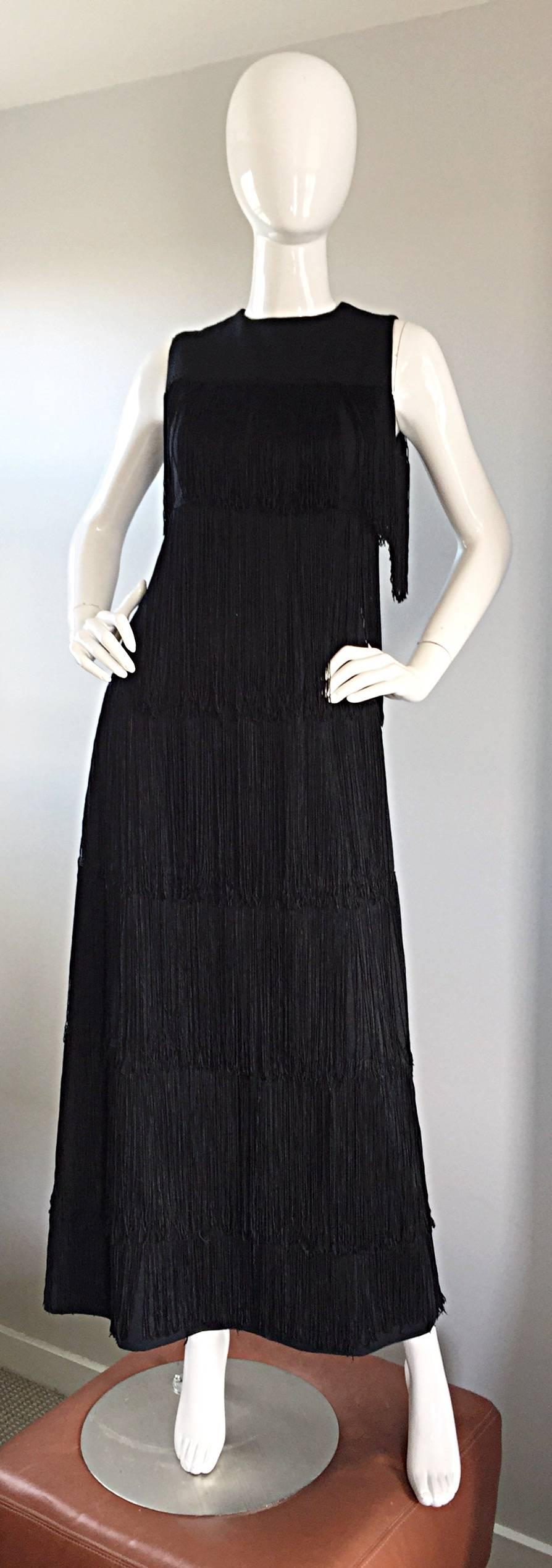 Absolutely fabulous rare 60s ALFRED WERBER black crepe all-over fringed dress! Features hand-sewn fringe panels throughout the entire dress. Looks amazing on, especially with movement. Alfred Werber was an exclusive designer to many starlets,