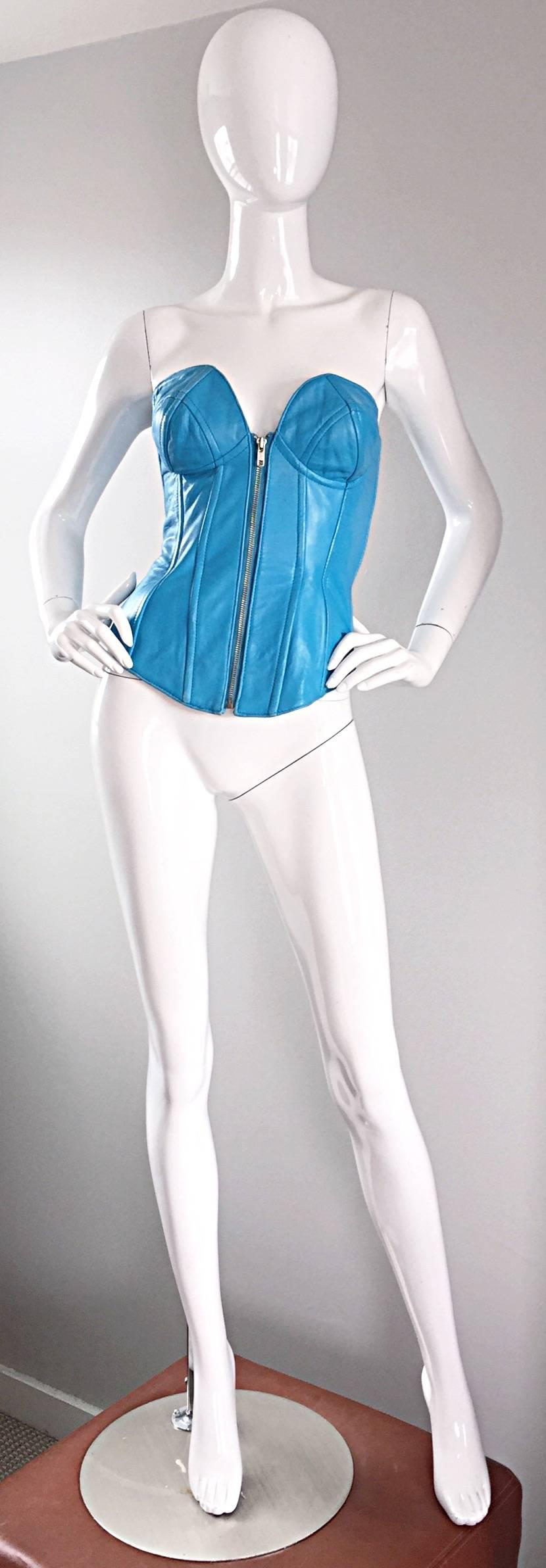 Sexy vintage NORTH BEACH LEATHER, by MICHAEL HOBAN, turquoise blue leather corset/bustier! Features a full silver metal zipper up the bodice. Intricate stitching throughout, and super flattering. Fully lined. Can easily be dressed up or down. Goes