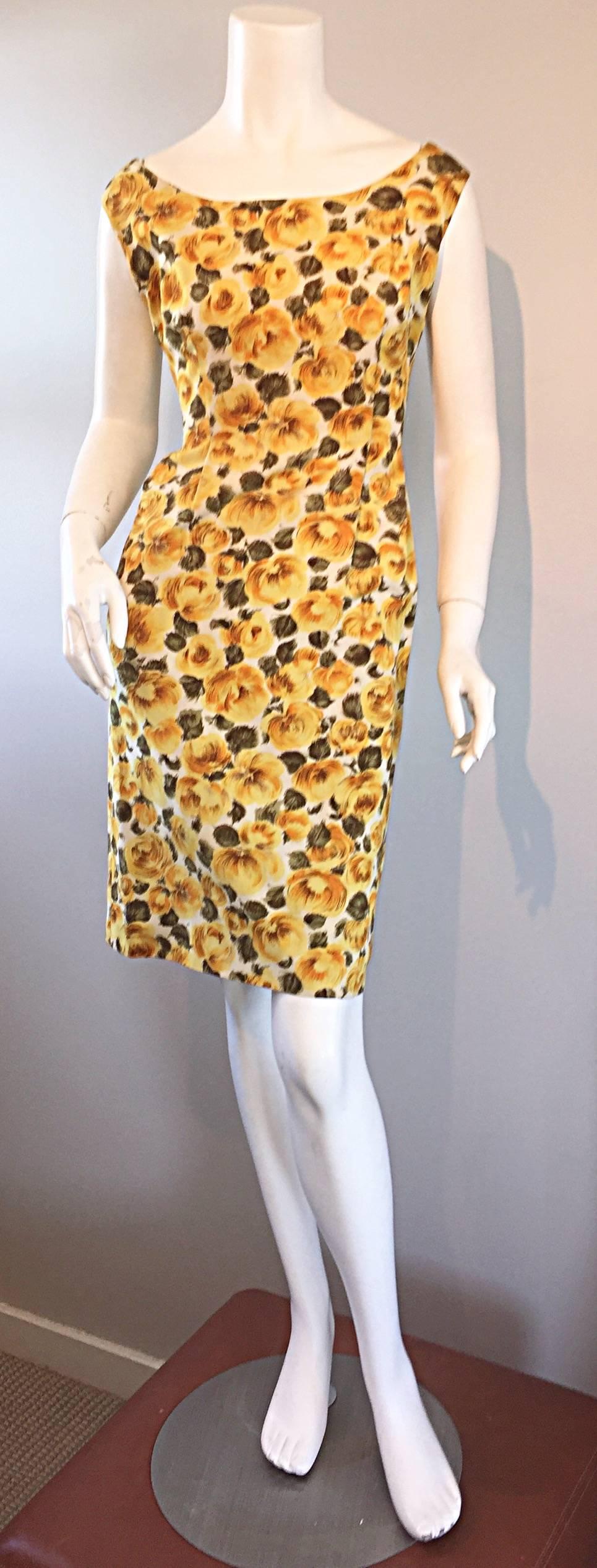 Rare exceptional vintage 1950s J.M. Ravene, of Paris, Demi couture silk wiggle dress! Ivory background, with yellow roses printed throughout. Mostly hand-sewn, this designer dress is truly a masterpiece! Amazing fit, that is timeless, and very