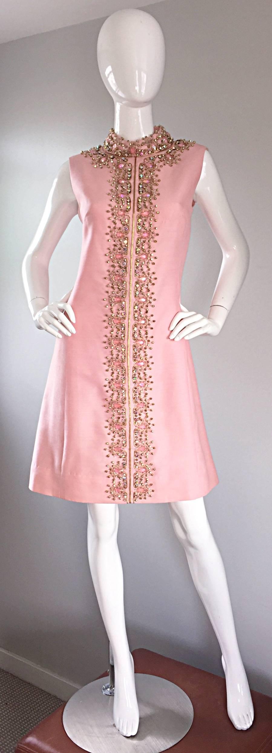THis is a very special dress...for many reasons! Gorgeous 1960s pink silk A-line dress! Features hand-sewn rhinestones, sequins, and beads throughout. Jeweled encrusted collar that is absolutely breathtaking (from the fron and back)! Perfect A-line