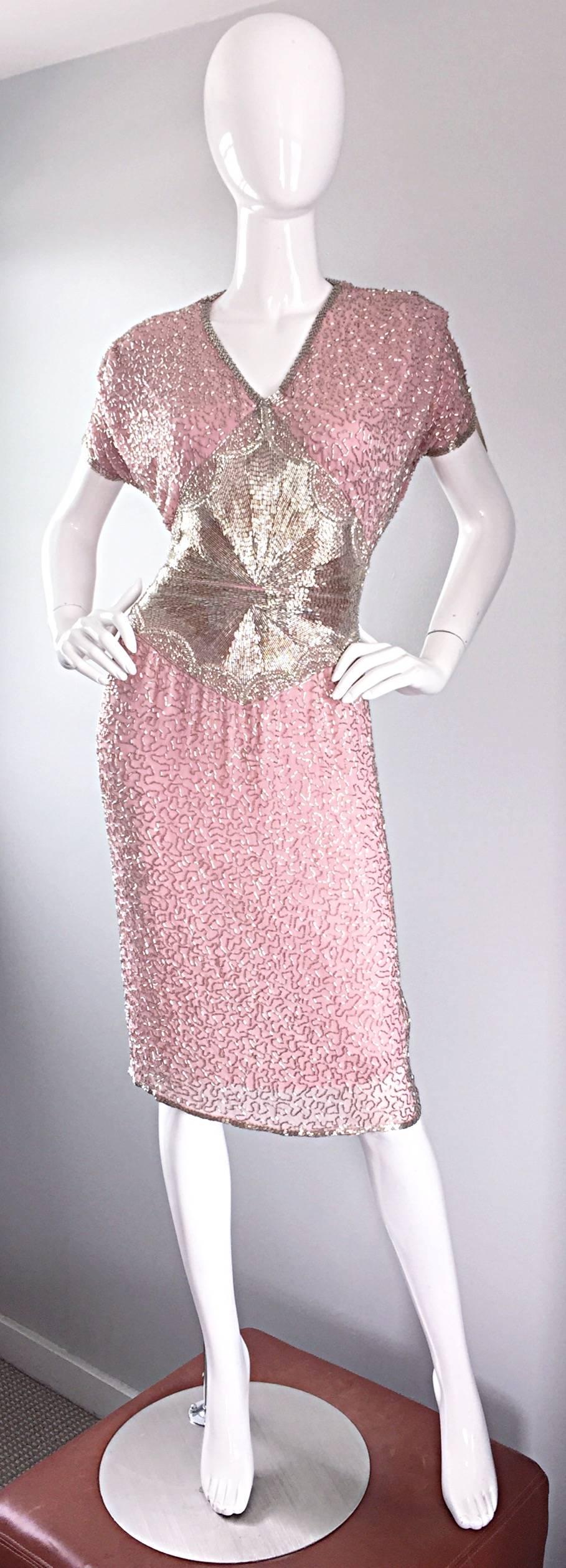 Gorgeous vintage OLEG CASSINI heavily beaded pink silk dress! Luxurious layers of pink silk and chiffon encrusted with thousands of hand-sewn silver beads. Absolutely stunning on! Drapes the body like a gem, and waist features slimming beadwork.
