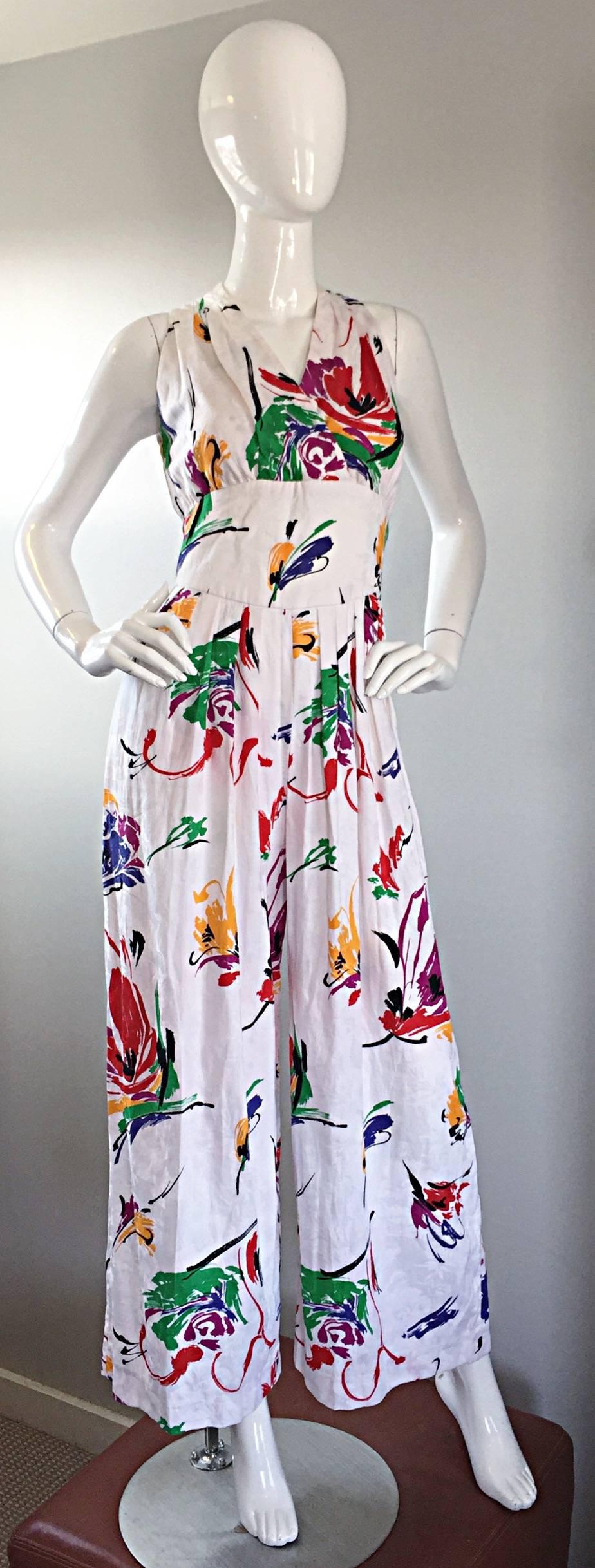 Amazing vintage RONNIE HELLER for BULLOCKS WILSHIRE white cotton halter jumpsuit! Awesome abstract designs that almost look like splatter paint. Wide palazzo legs, with a fitted bodice. Ties closed at back top neck. Pockets at both sides of the