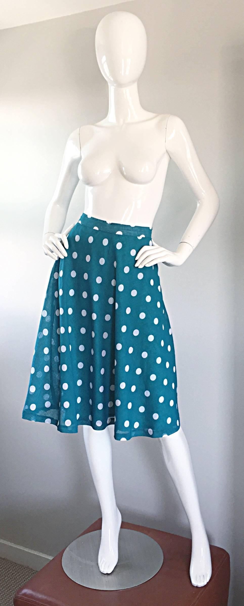 Adorable 1950s turquoise and white polka dot cotton voile skirt! Features allover printed polka dots. Fine cotton voile, that has incredible movement. Double layered fabric. Extremely well made, and can easily fit a crinoline or petticoat under for