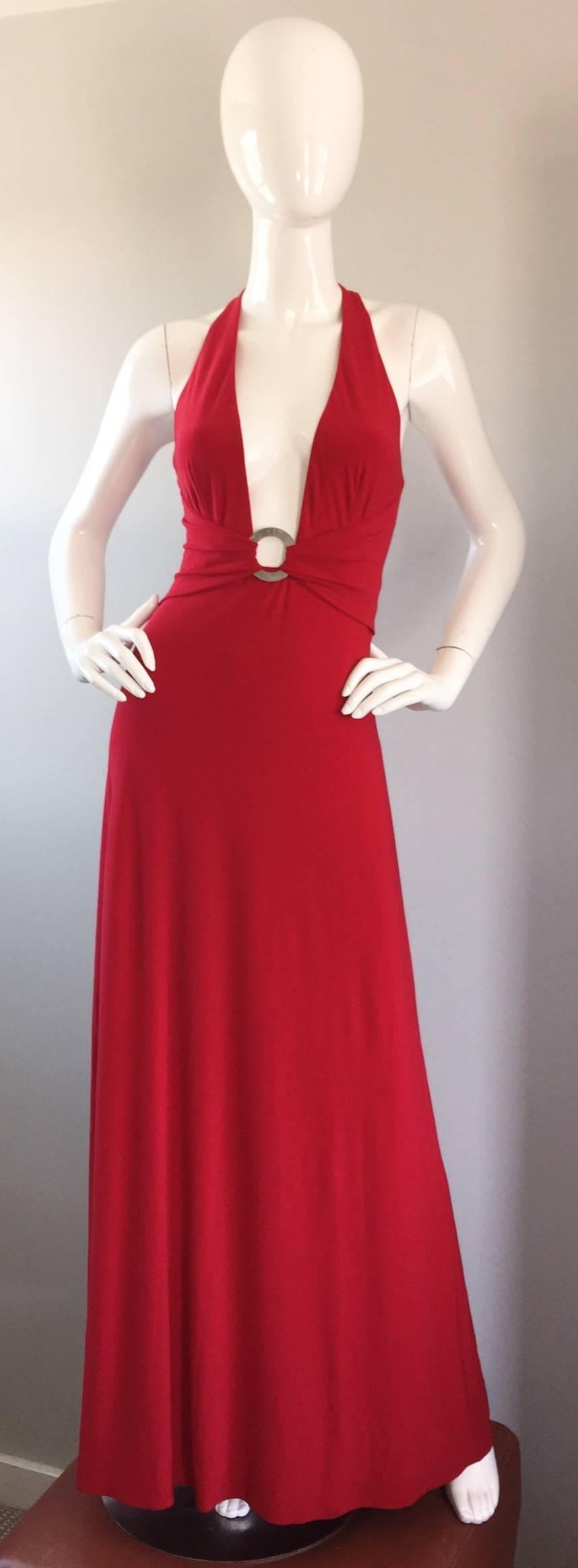 Sexiest vintage LILLIE RUBIN red gown, with a daring plunge! Looks sensational on! Features a matted silver nickel loop below bust. Comfortable, yet extremely flattering 2-ply high quality jersey. A definite head turner! In great condition. Made in