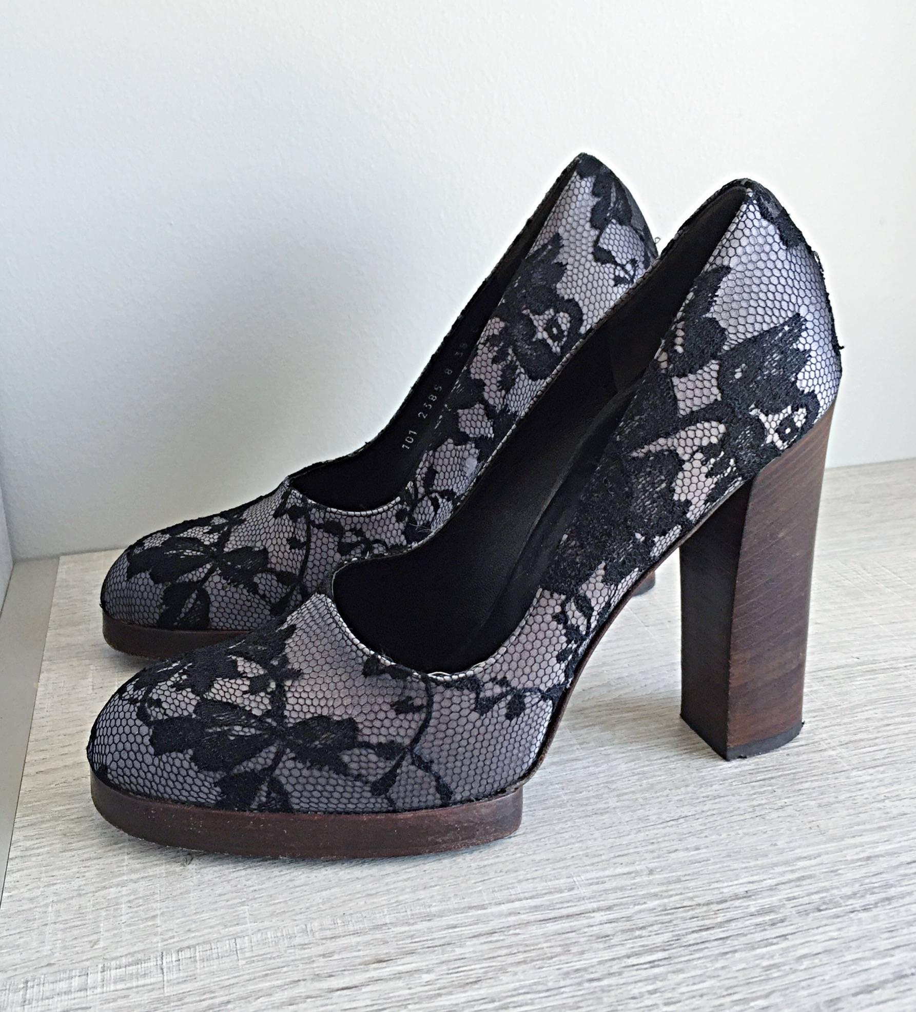 Rare TOM FORD for GUCCI early 2000s black and gray lace shoes! Beautiful gray silk, with an overlay of black French lace. Stacked wooden heel makes for a very comftorable heel. Looks great with jeans, a skirt, or a dress. Can easily transition from