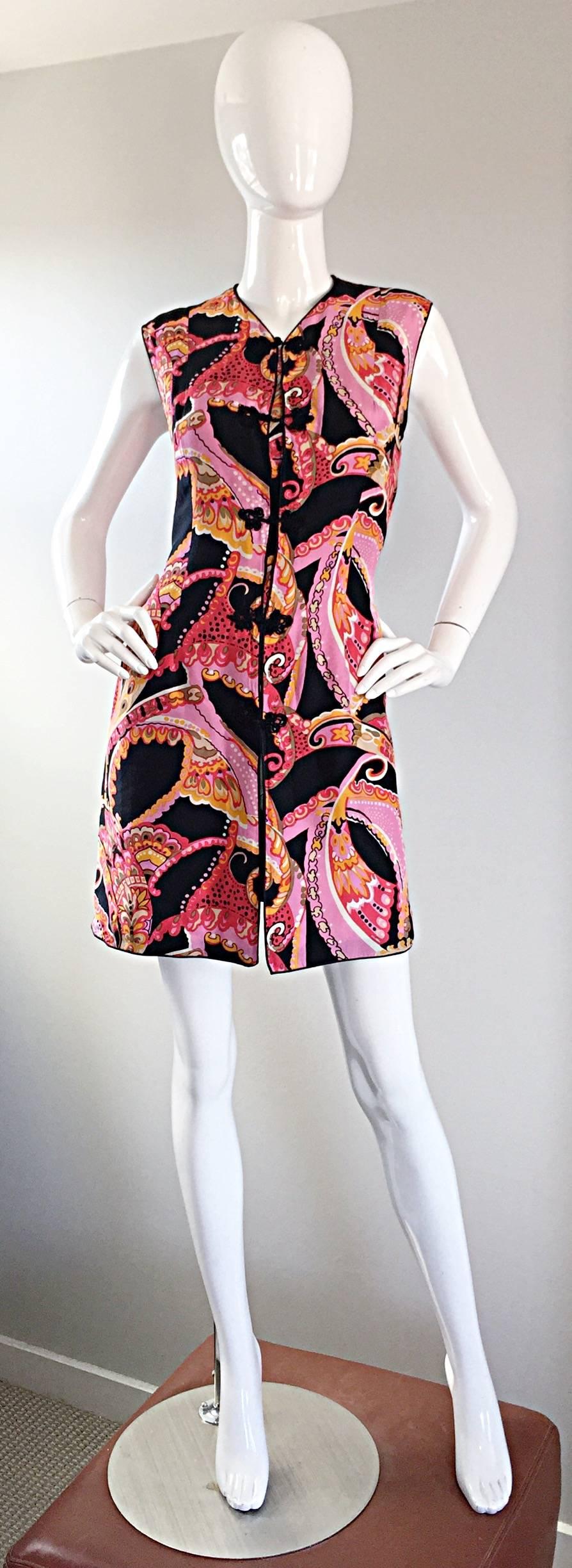 Awesome vintage 60s retro silk 'Asian' themed long silk vest or mini dress! Features a psychedelic print of pink, fuchsia, black, orange, red, brown and black throughout. Intricate silk Asian buttons down the bodice. Fully lined. Vents at both sides
