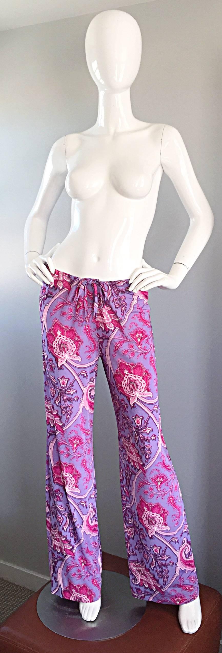Amazing 1990s 90s ETRO vintage wide leg silk palazzo trousers! Amazing vibrant colors of lavender purples and fuchsia pinks in oversized paisley prints! 1970s / 70s feel! Drawstring waist can accommodate an array of sizes. Light and breezy that look