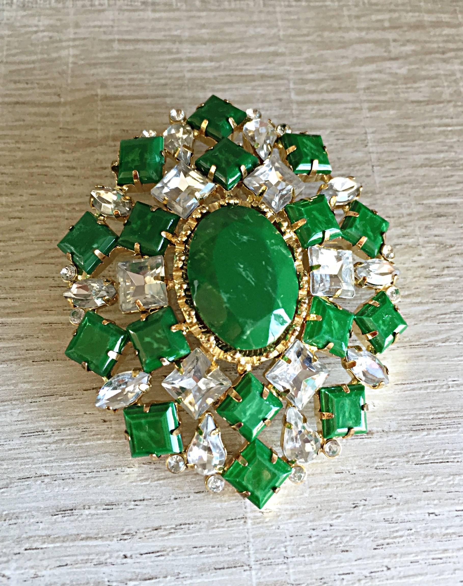Amazing vintage 60s ARNOLD SCAASI signed large emerald green and rhinestone brooch pin! Features opaque vibrant green mixed with rhinestones. This gem can really make an outfit. Perfect on a blazer, sweater, or jacket. Would look amazing pinned to a