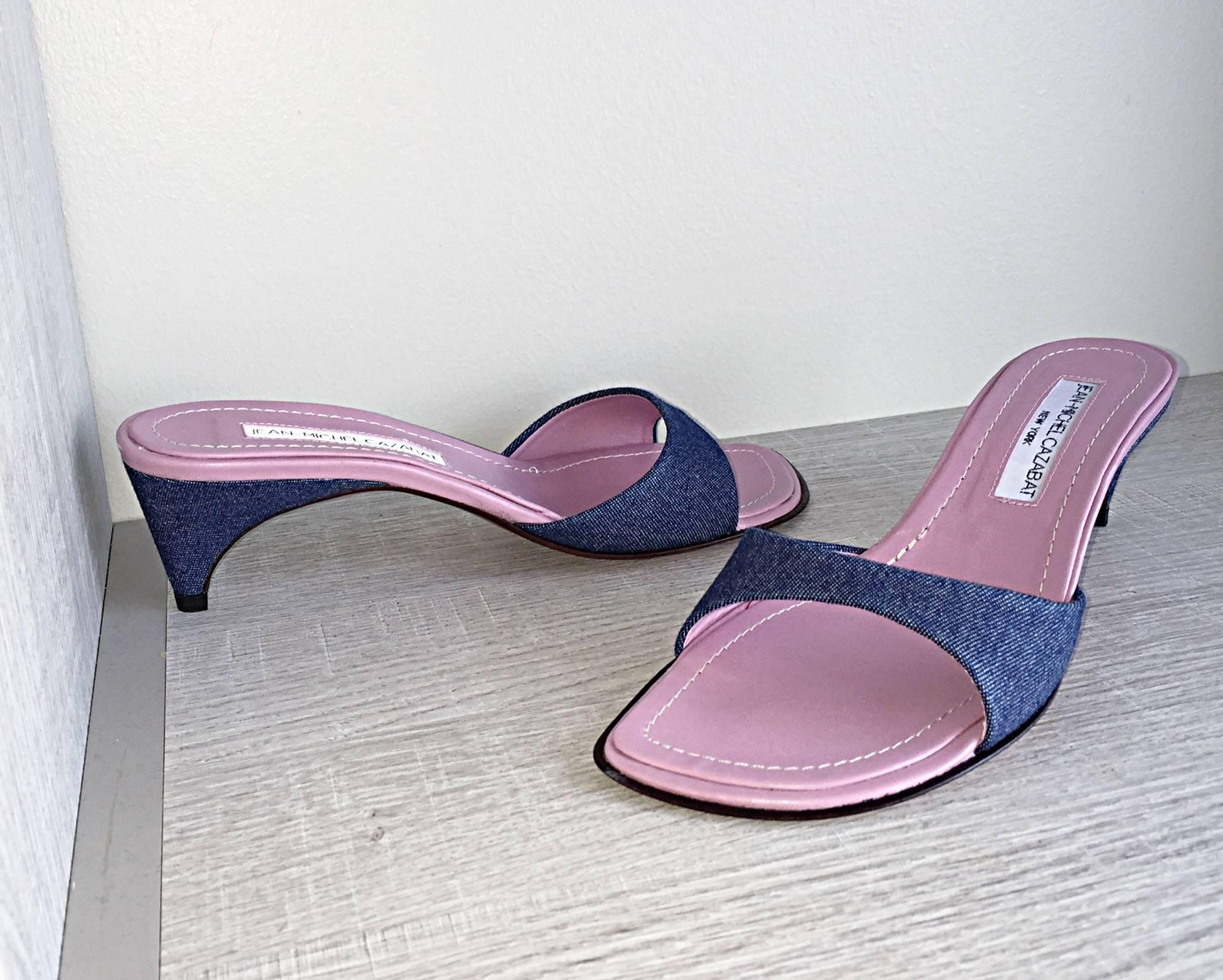 Brand new pair of JEAN-MICHELE CAZABAT denim kitten heel sandals /slides! From his debut collection (under his own name) in 1999! Dark denim, with a lilac leather insole. Features a vibrant red bottom sole. Avant Garde structured heel. Looks great