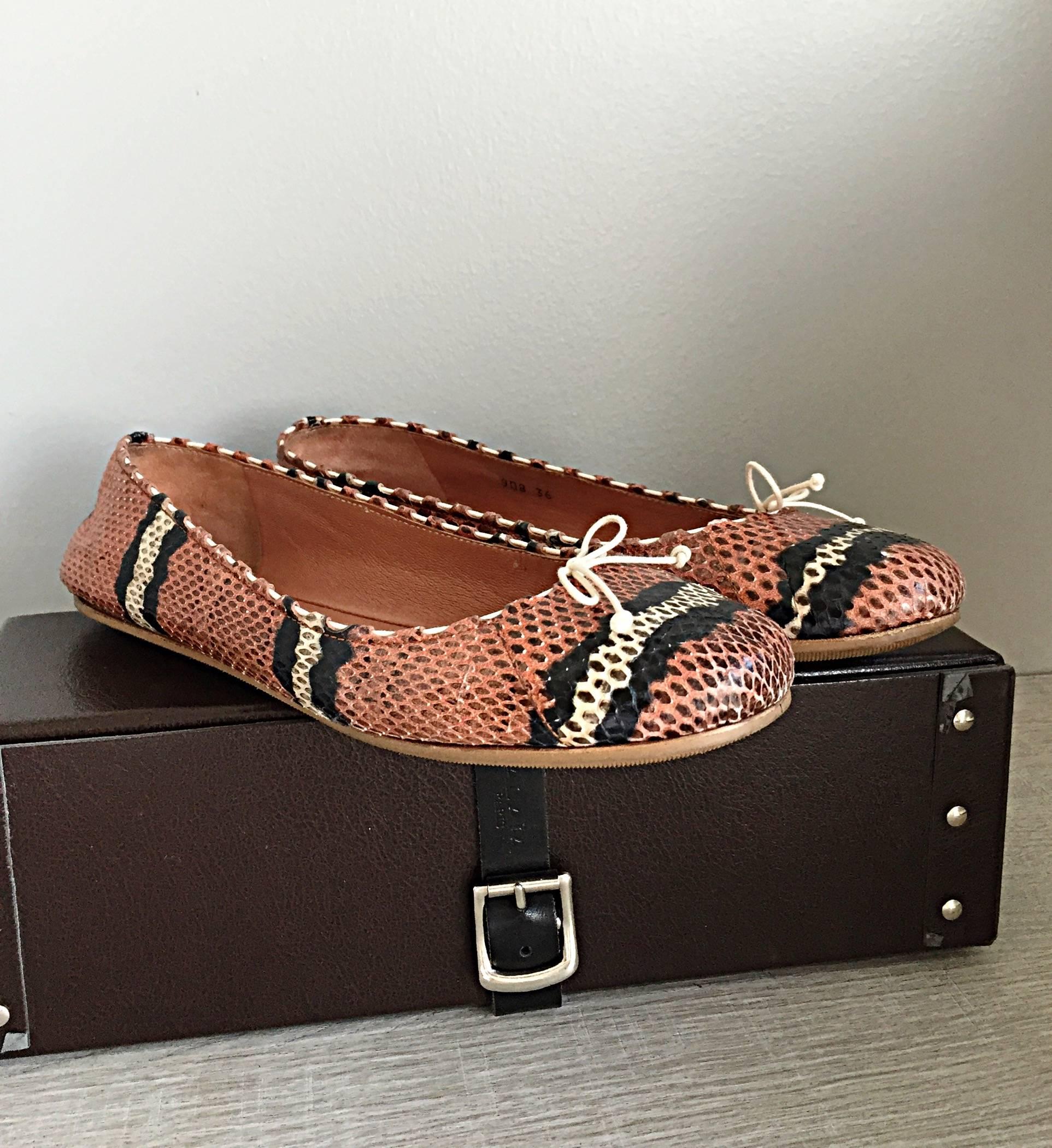 Awesome pair of ALAIA python ballet flats! Perfect combination of pink, brown, black and cream, that can be worn with everything all year! Comes with original unique Alaia shoebox. Super comfortable, and great bare legged, or with stockings. Flirty
