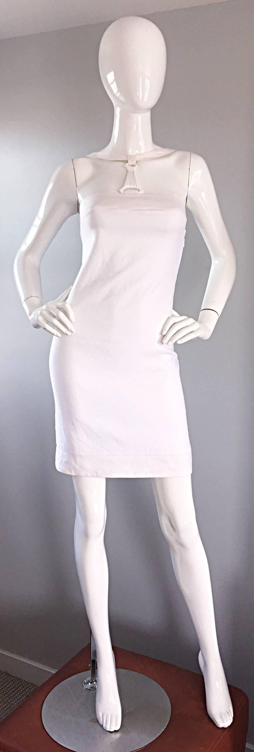 Sexy rare vintage early 2000s GIANNI VERSACE white bondage linen dress! Flattering BodyCon fit that does wonders for the body! Fully lined. Features a white metal 'harness' with signature Medusa head. Multiple hidden snaps to fasten the harness at