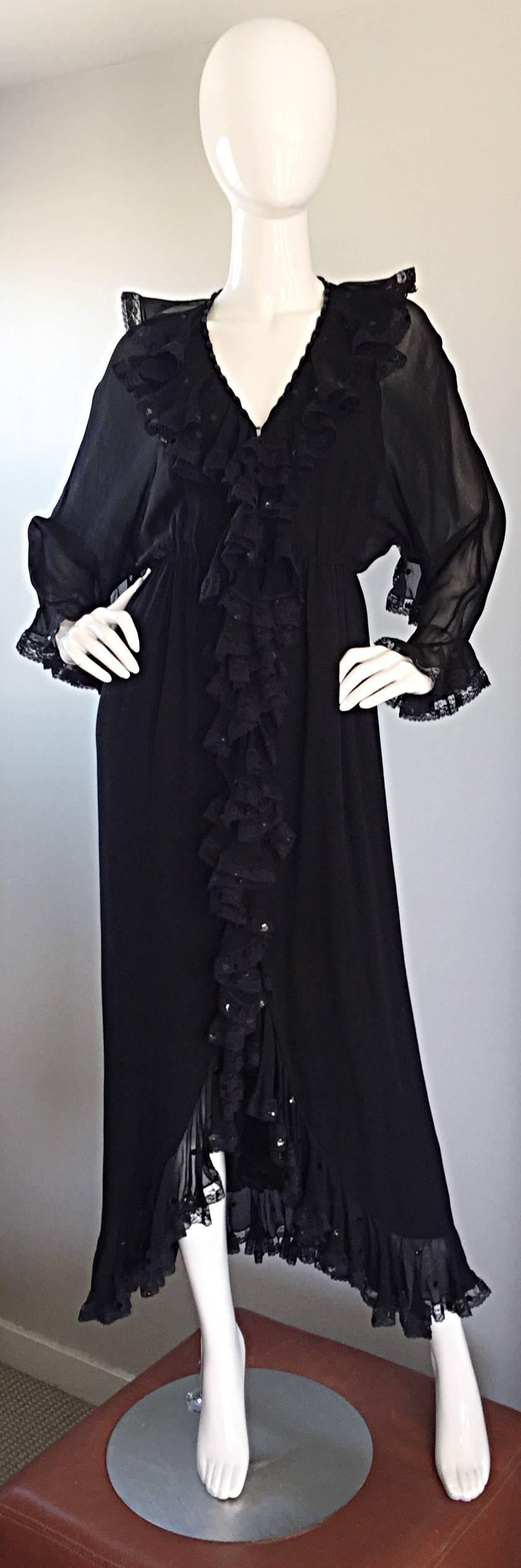 Absolutely insanely gorgeous vintage 1970s BILL BLASS black silk chiffon long sleeve dress! Features intricately detailed silk lace ruffles down the front of the dress, sleeves and collar. Semi sheer chiffon sleeves. Demi couture quality, with