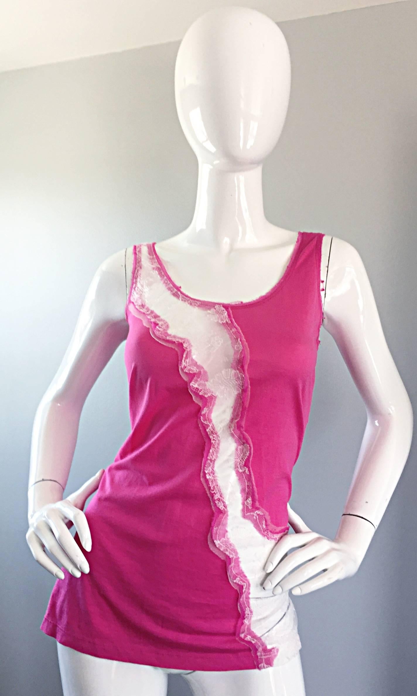 Sexy 2000s JOHN GALLIANO hot pink / fuchsia and white sleeveless top with an asymmetrical lace cut-out down the bodice! Reveals just the right amount of skin. Looks great with shorts, jeans, trousers, or a skirt. In great condition. Made in Italy.
