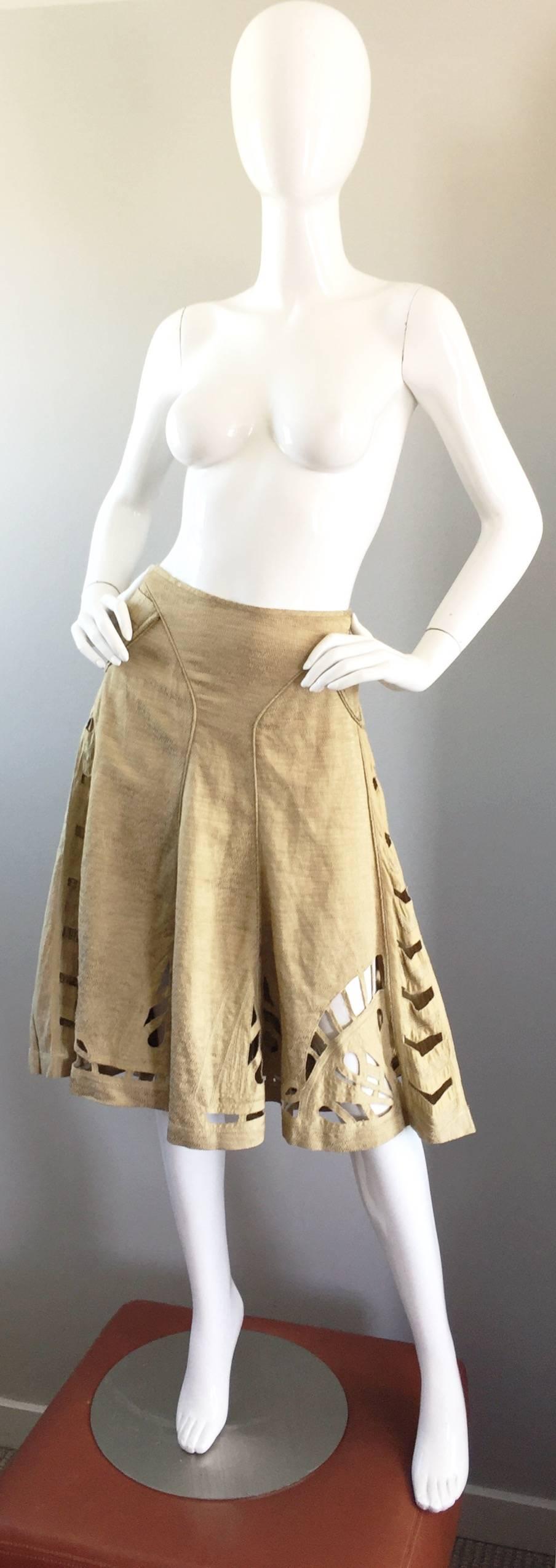 Gorgeous and super flattering ZAC POSEN khaki soft textured cotton and linen crochet cut-out skirt! Full A-line fit, with a hidden zipper and hook-and-eye closure at the side. Tons of hand-work went into the construction of this gem. Features