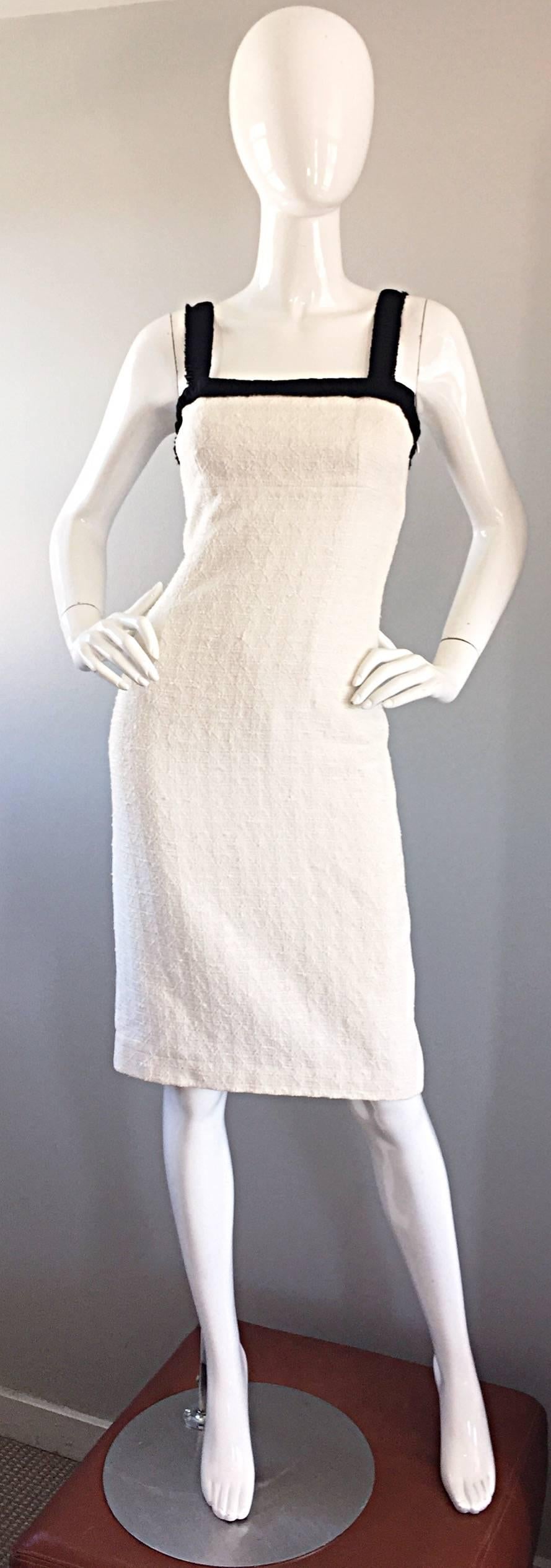 Such a flattering MICHAEL KORS COLLECTION (Made in Italy) white and black textured cotton and silk dress. Signature Kors quality and fit...There is a reason Michael Kors has a bit of a 'cult' following amongst his loyal clientele! I can attest to