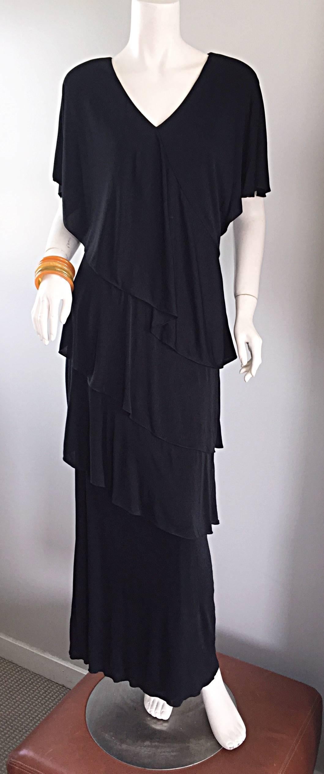 Incredible signature 1970s / 70s HOLLY'S HARP black silk jersey tiered layered boho dress / gown! Constructed with Harp's signature drapes. V-Neck, with three tiers down the front and back. Super flattering, and extremely comfortable. Definitely a