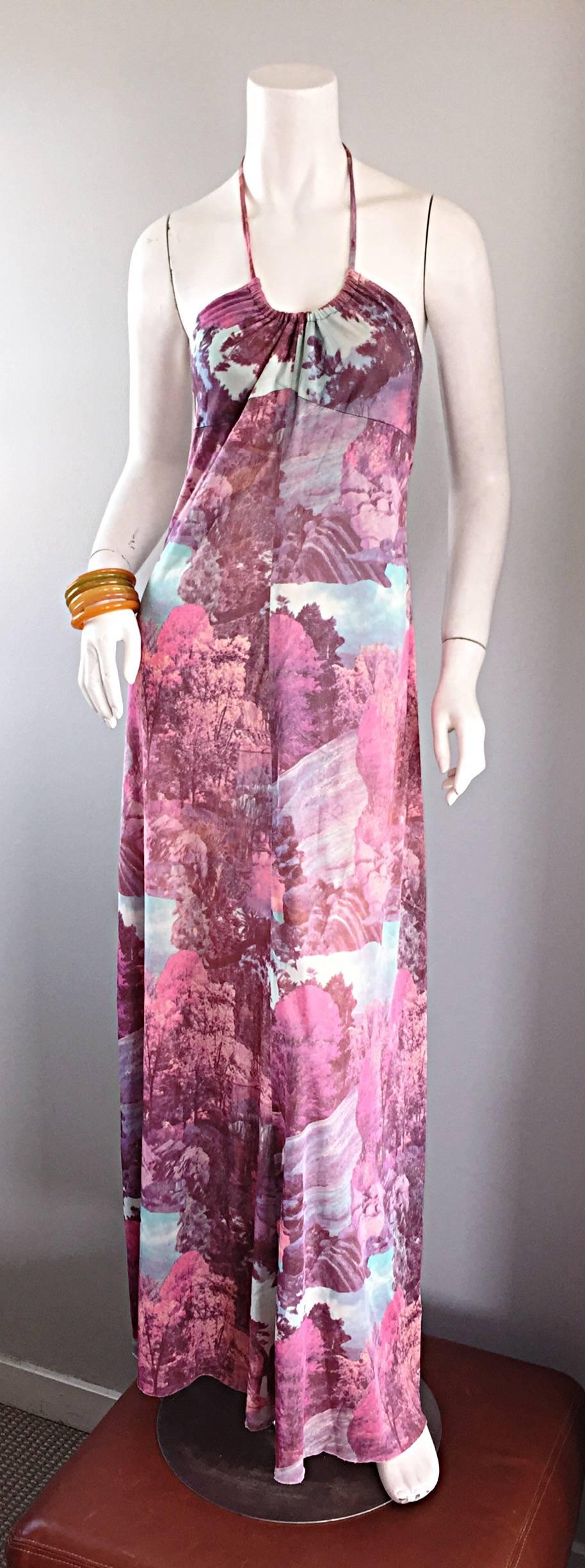 Amazing 1970s vintage novelty halter maxi dress! I have never seen another dress quite like this, and most likely never will again. Features an all-over print of autumn trees and waterfalls...A soothing, yet statement worthy print on an utterly chic