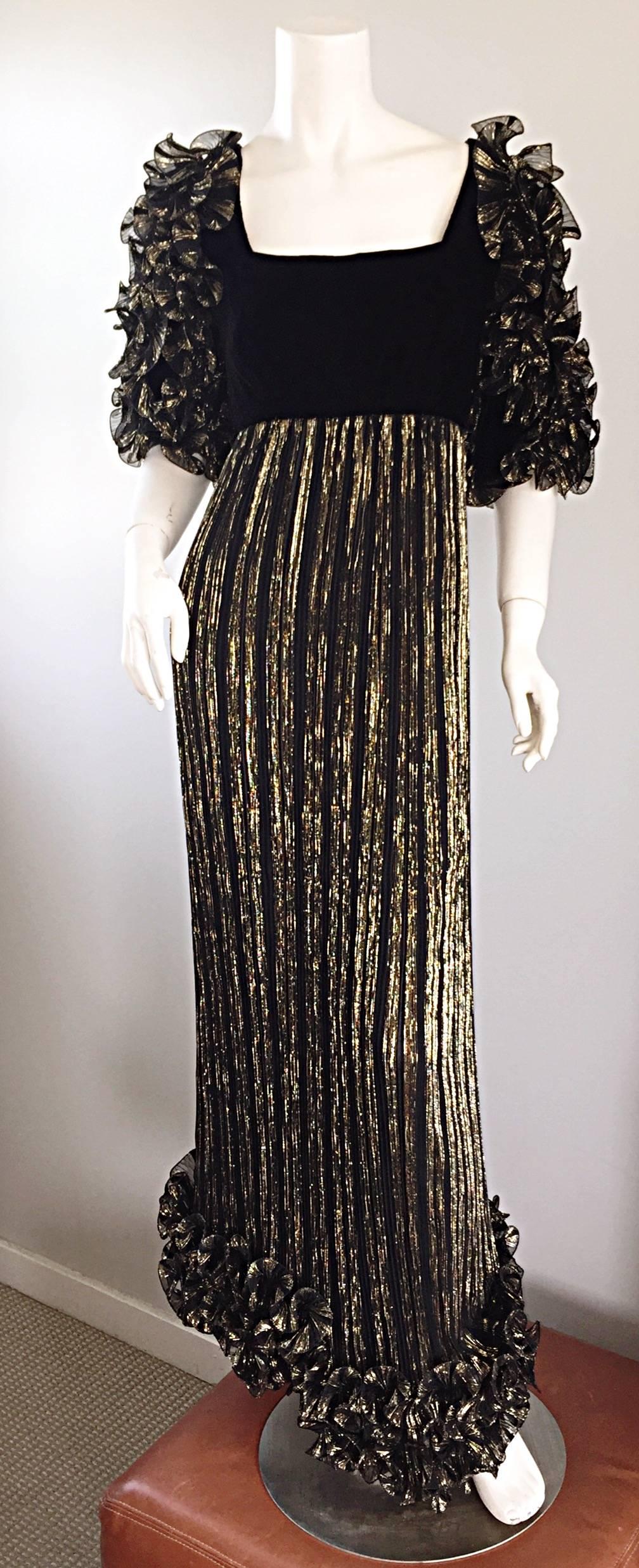 Incredible vintage ALFRED BOSAND couture black and gold gown! Features a silk accordion pleated gold skirt with attached black silk velvet bodice. Amazing ruffled sleeves with same gold accordion pleating as skirt. Couture quality with hand-sewn