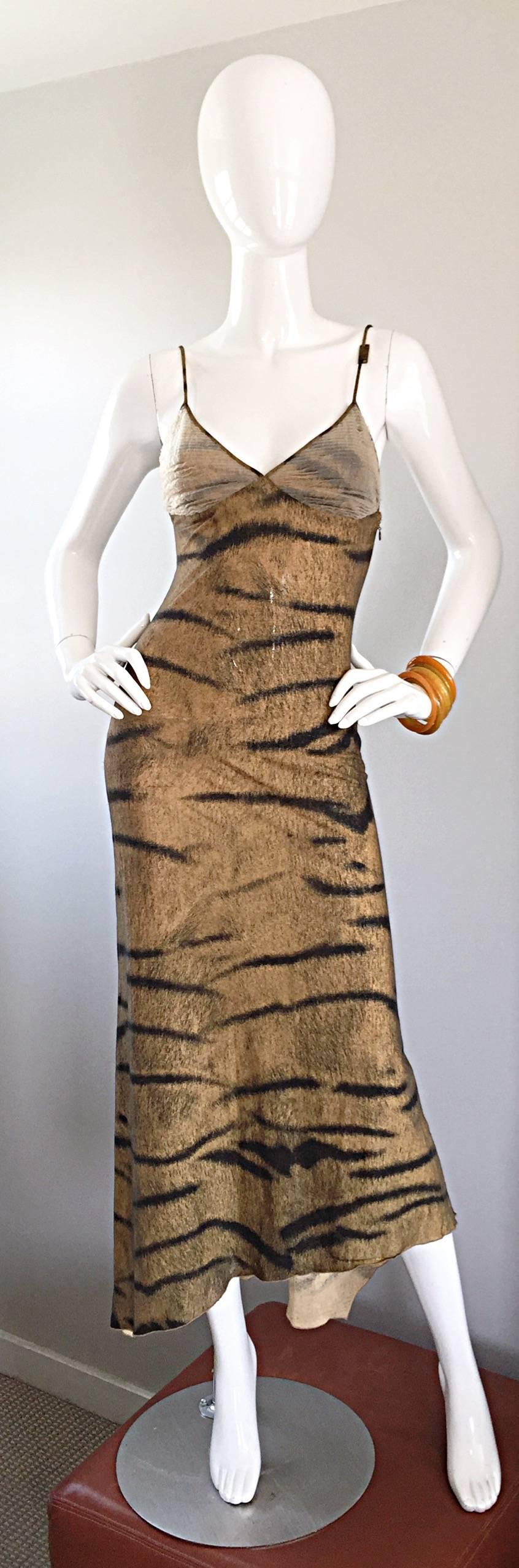 Sexy vintage early 90s ROBERTO CAVALLI tiger print asymmetrical dress! Flattering stretch to fit bodycon rayon material. High-low asymmetrical hem  that dips in the back. Silk organza overlay on the bust. Hidden zipper up the side with hook-and-eye